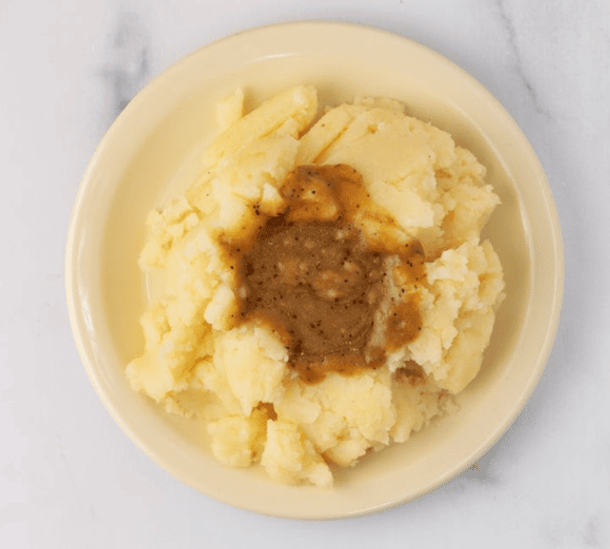 Zion Delight mashed potatoes with gravy — Southern soul food side Atlanta