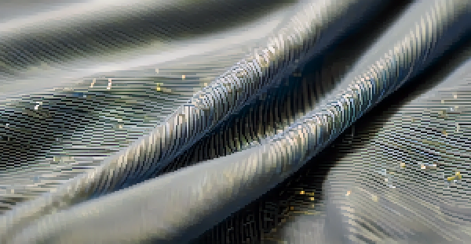 Close-up of a smart fabric shirt featuring embedded sensors and conductive threads, highlighting its modern design and texture.