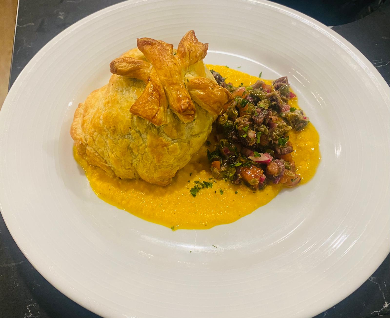 high end croissant meal on plate