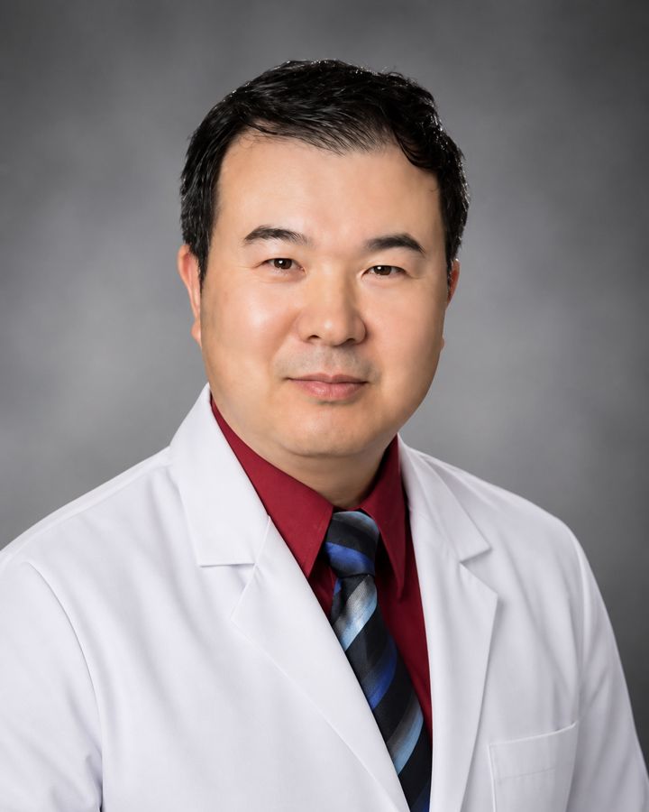 Photo of Dr. Yue Wang Attending Physician 