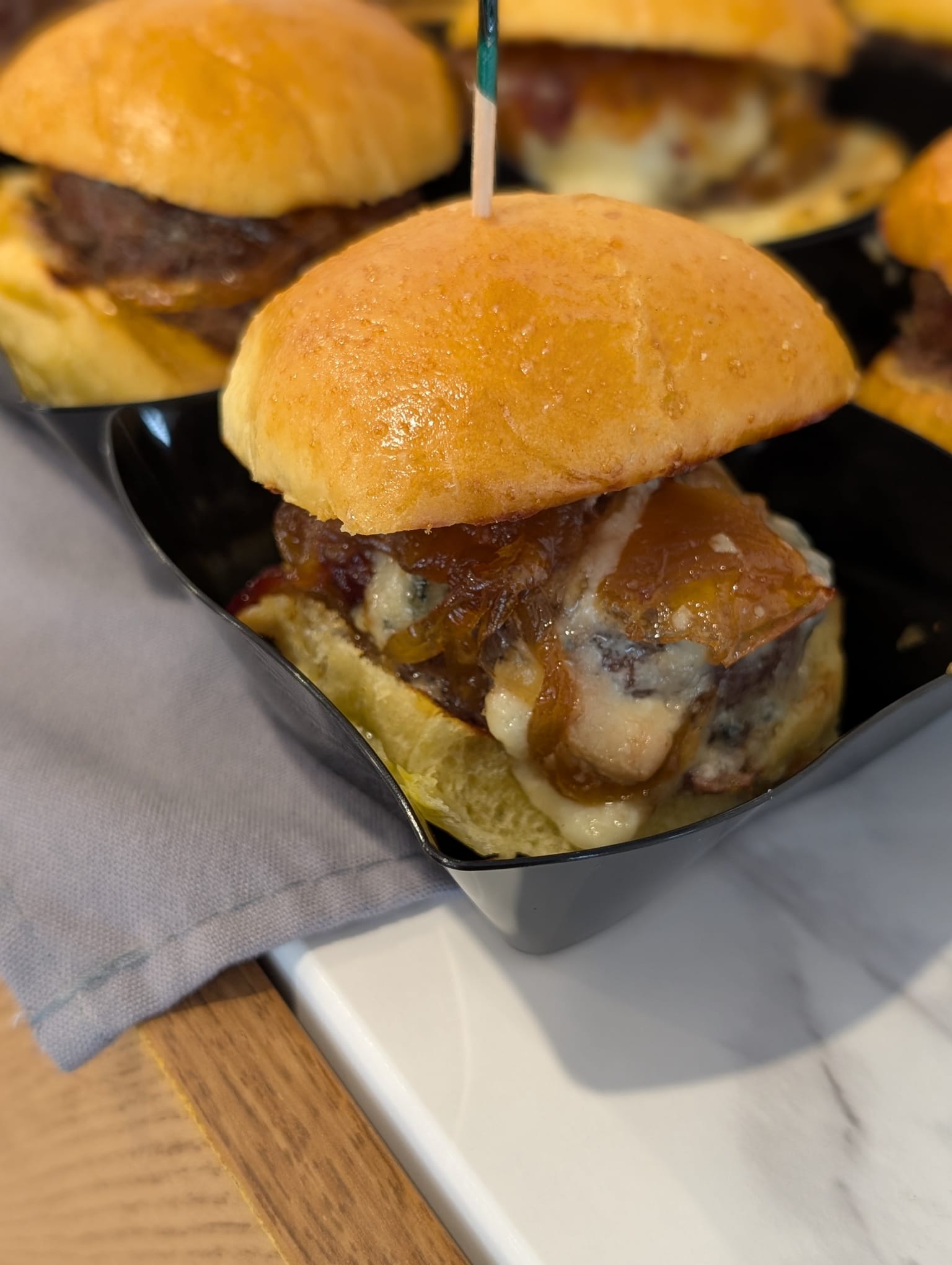 plates of mouth-watering bacon cheeseburger sliders