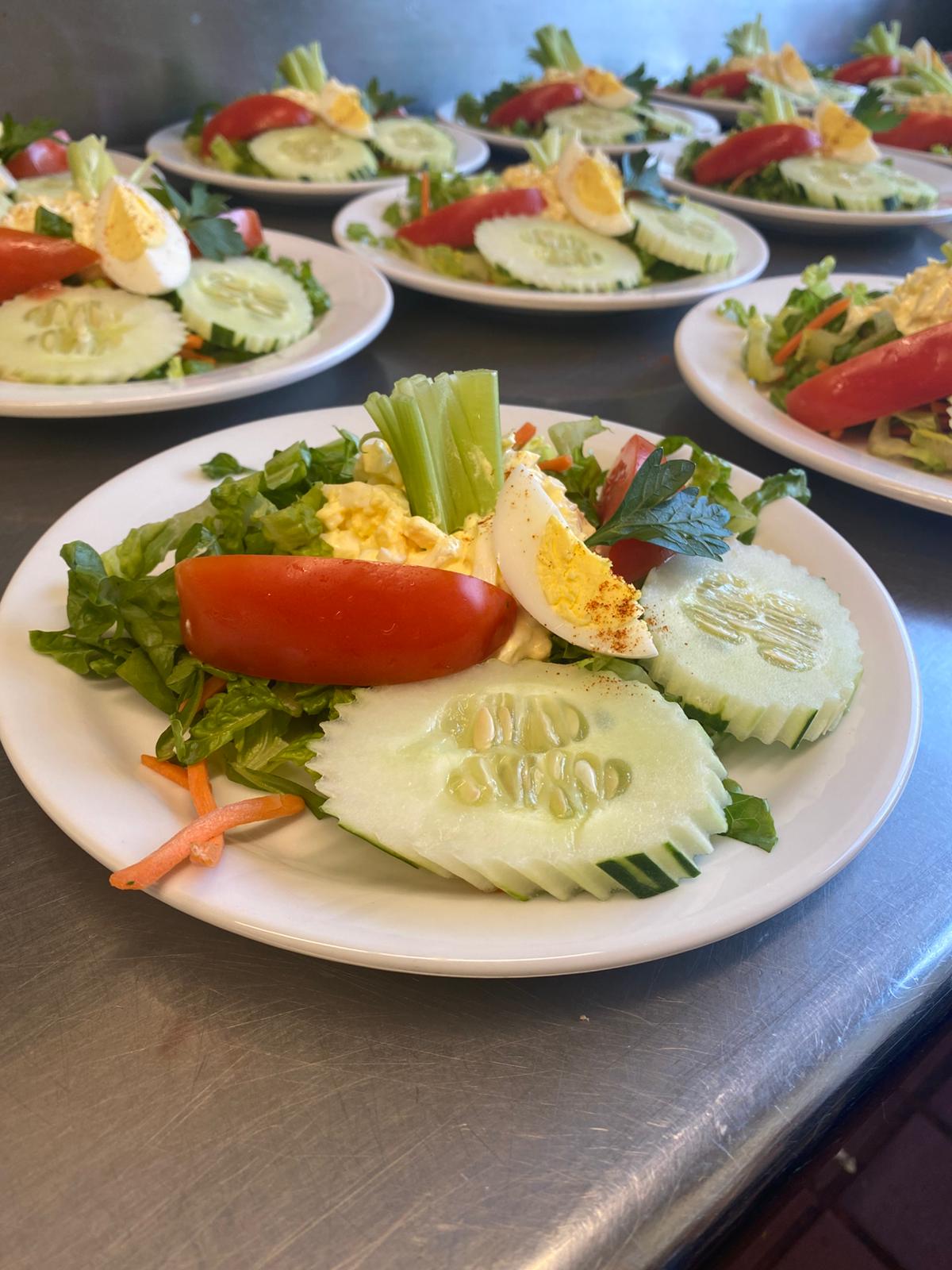 plates of nutritious and tasty looking salads