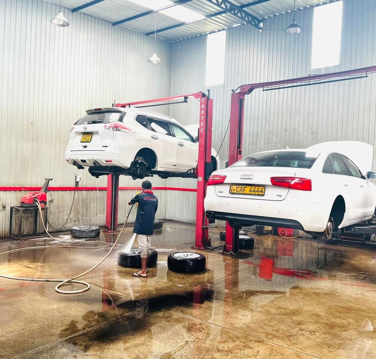 twm cartec lifts cars underwash