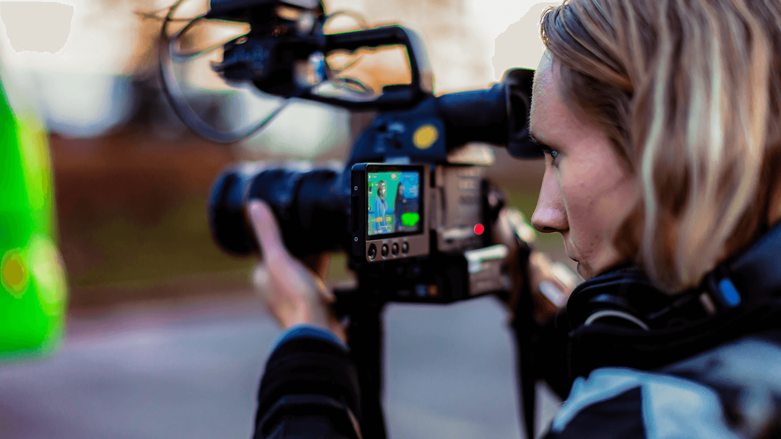 A Roadtrip Nation director looks through her camera.