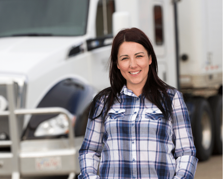 Woman in front of truck, hoping Chain.io can Improve booking rates, sales performance, and populate visibility dashboards for improved customer experience by integrating with customizable online booking portals.