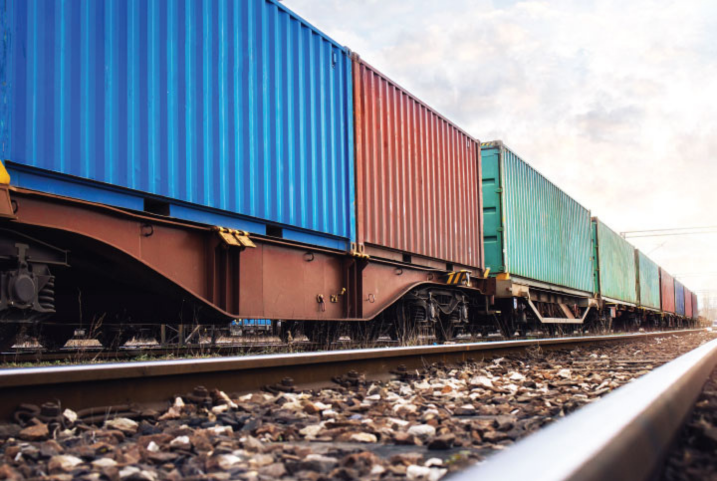 cargo containers loaded on a train. Congress’ attempt to intervene with the on-going dispute over demurrage and detention fees gives shippers too few tools to hold carriers and terminal operators accountable for unjust fees.