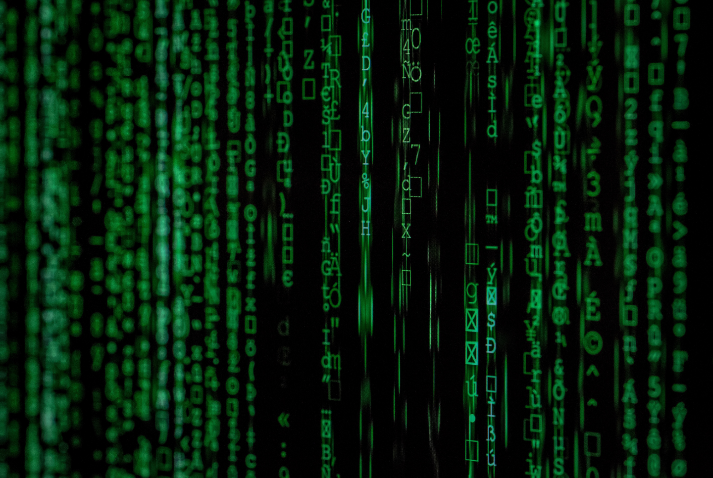Lines of code in green and black. Supply chain integrations help big box retailers take control over their information and provide better customer service.