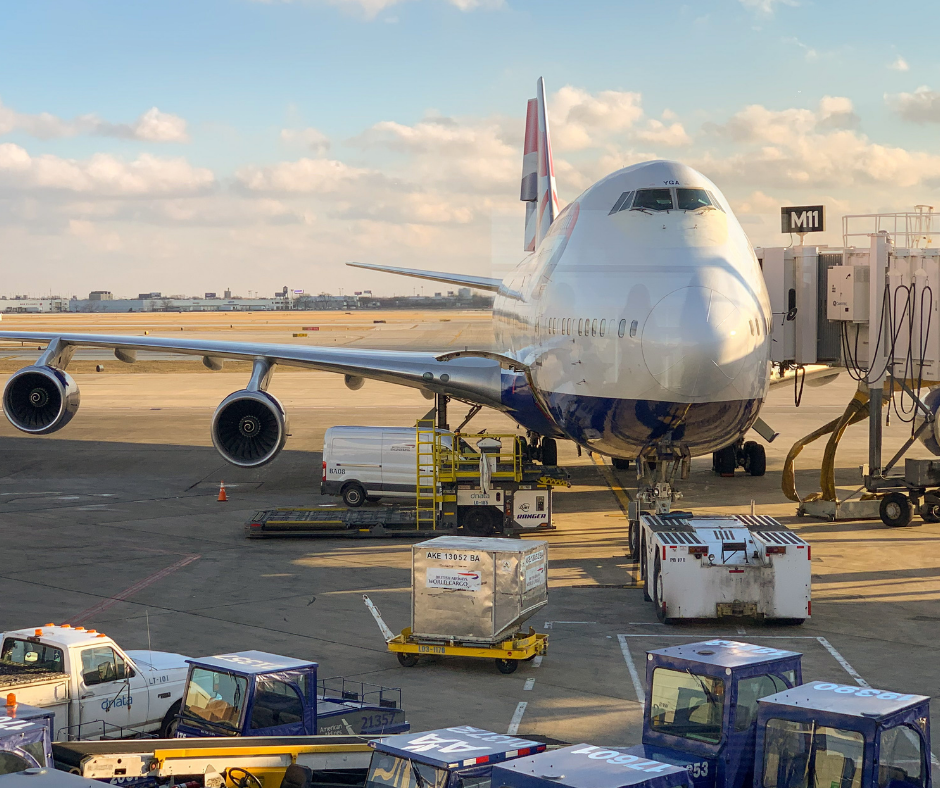 Airplane being loaded with cargo.