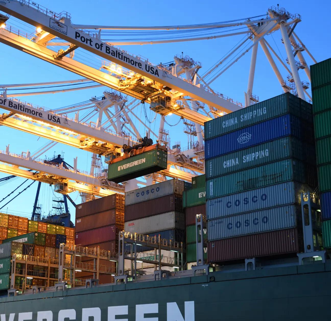 Port managing the unloading and shipment of freight with supply chain technology.