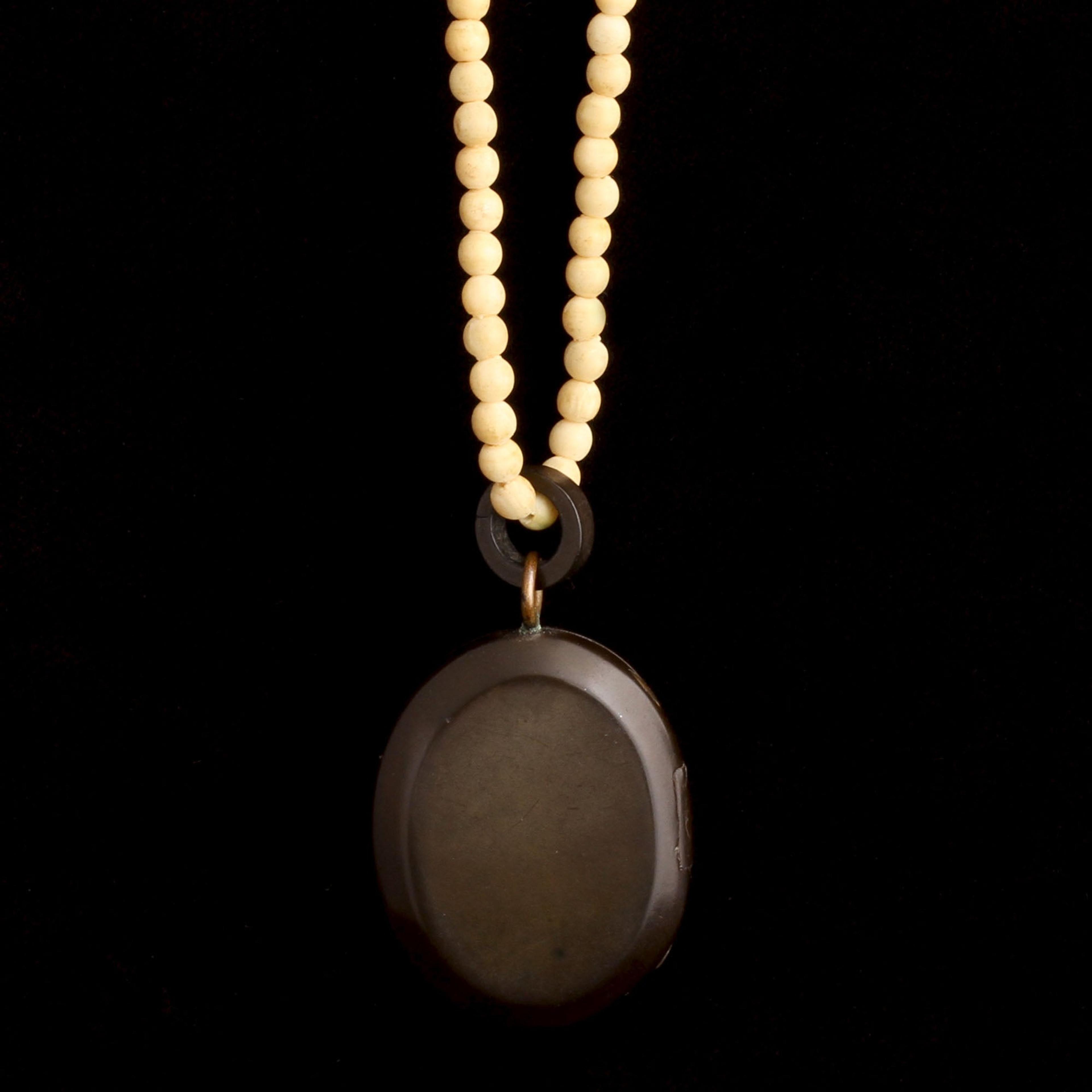 Child's Bone Necklace with Gutta Percha Locket