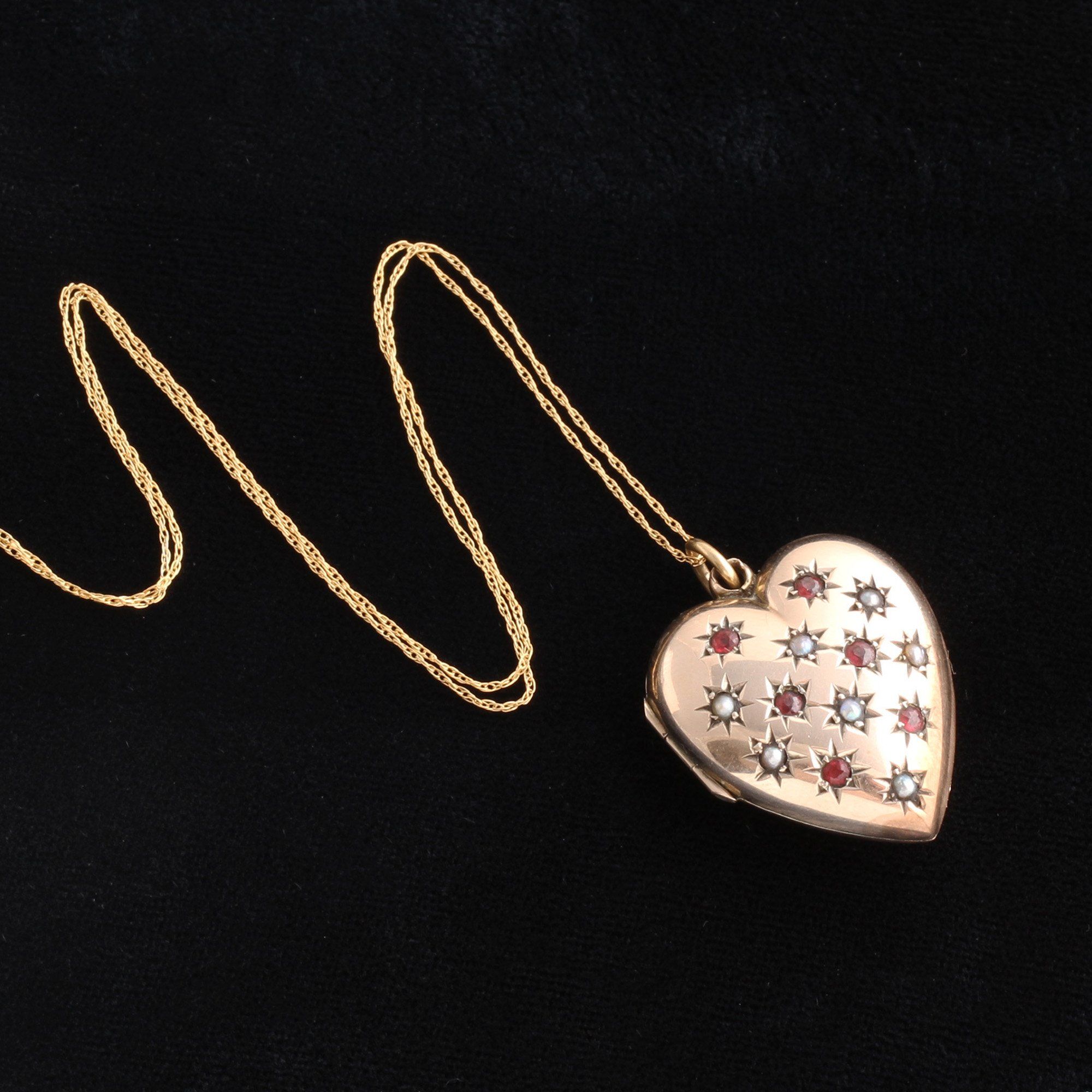 Detail of Victorian Garnet and Pearl Heart Locket