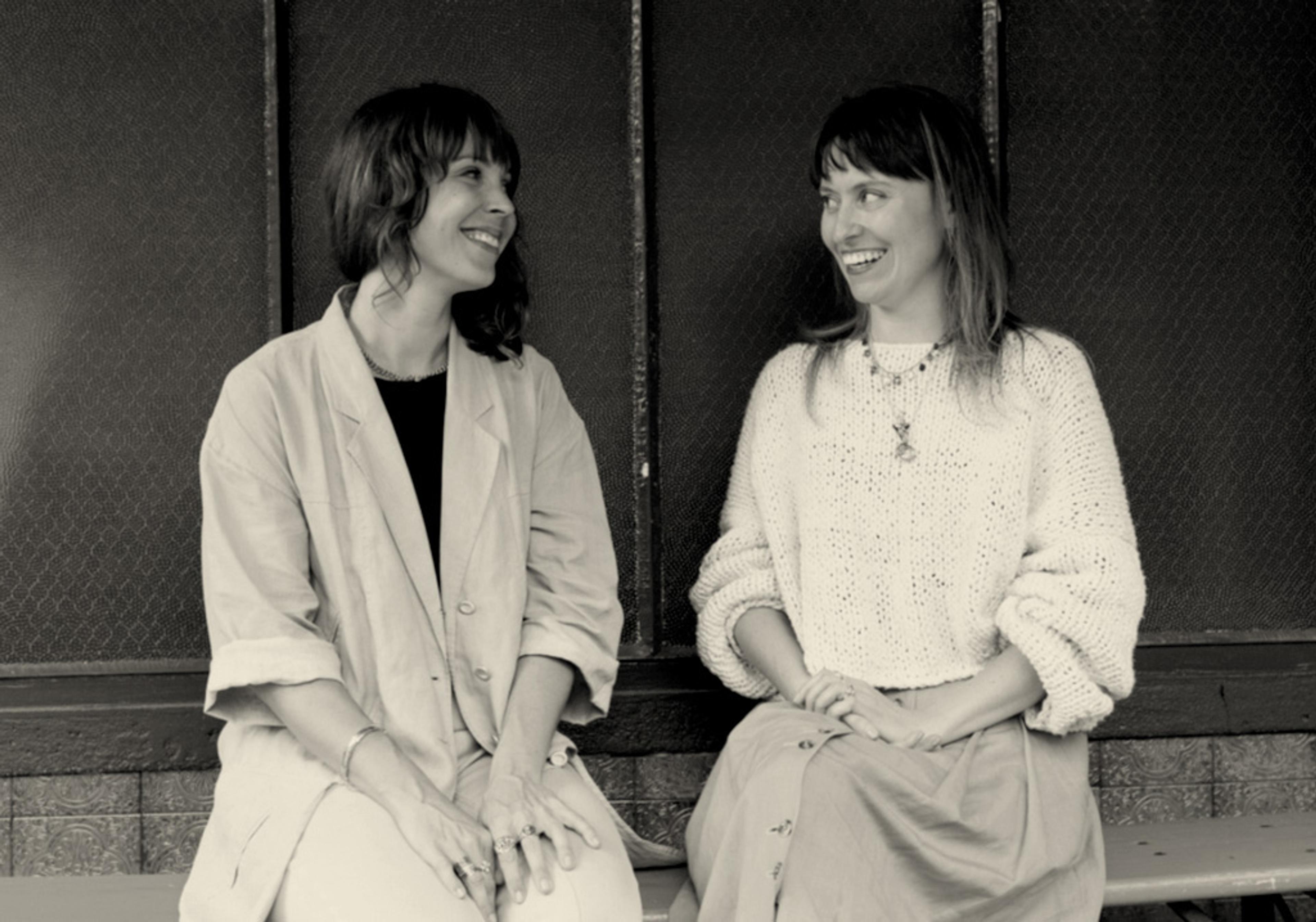 Erica and Lindsay looking goofily at each other.