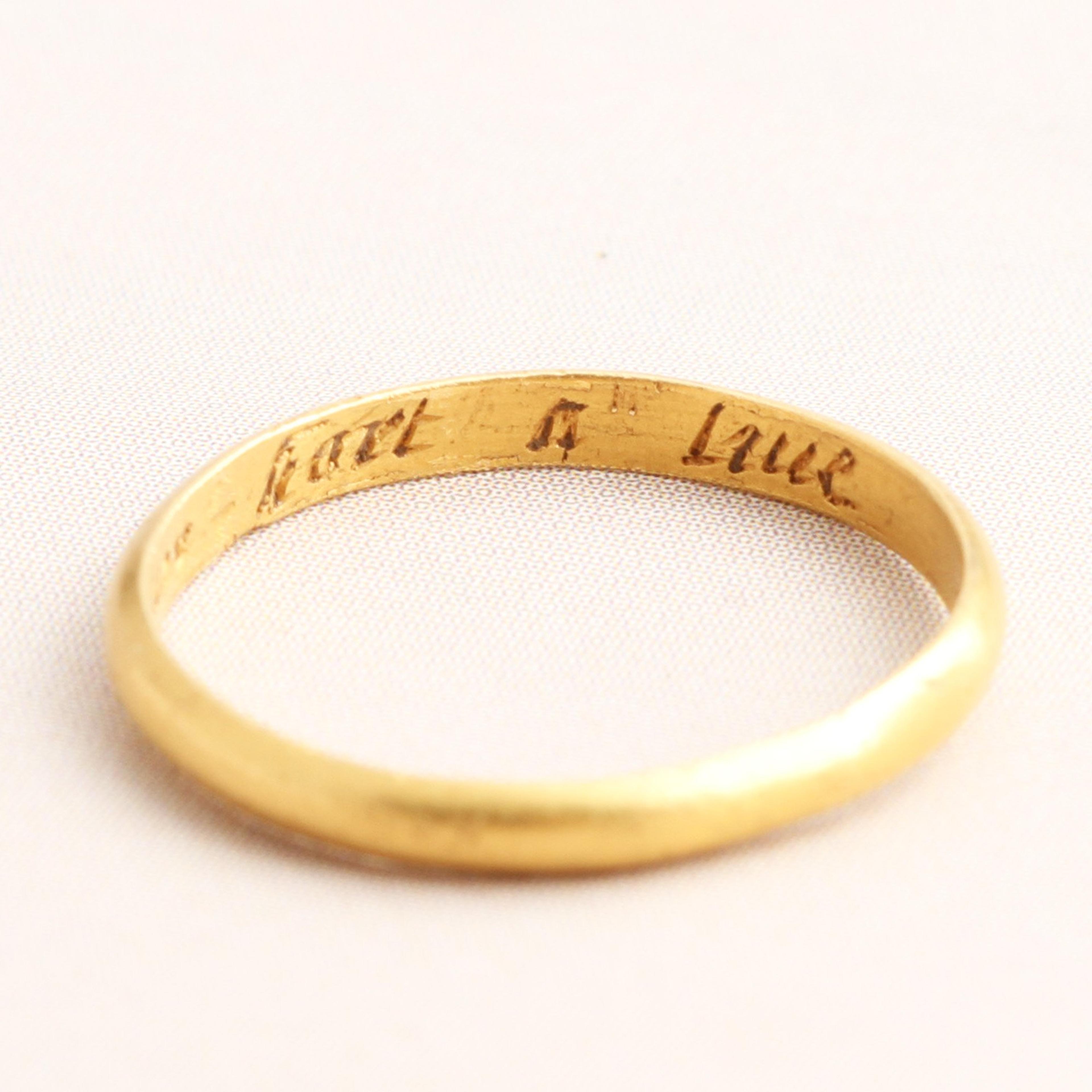 Detail of "Nott a truer hart A live" Poesy Ring