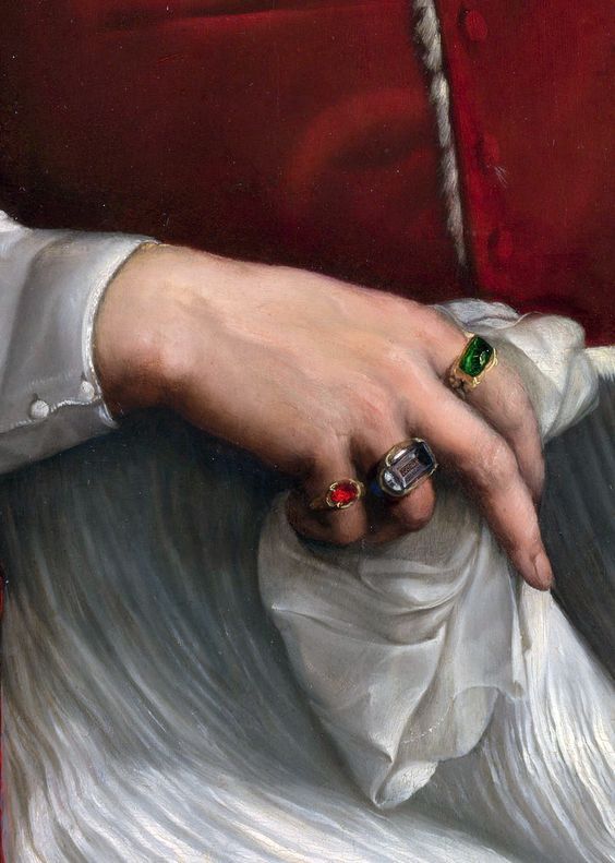 A large table-cut diamond worn on the third finger of the right hand. Detail of Pope Julius II by Raphael, 1511. National Portrait Gallery London. 