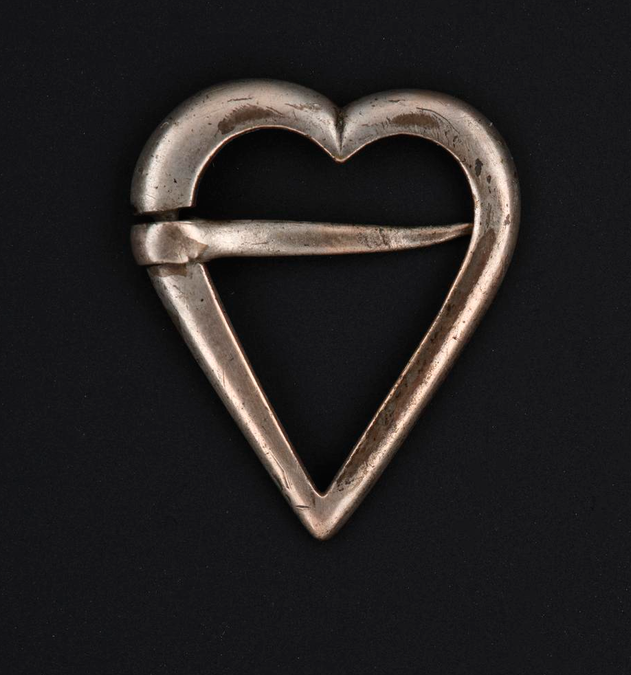 Silver heart-shaped brooch, inscribed, "Love" on the reverse. National Museums Scotland.