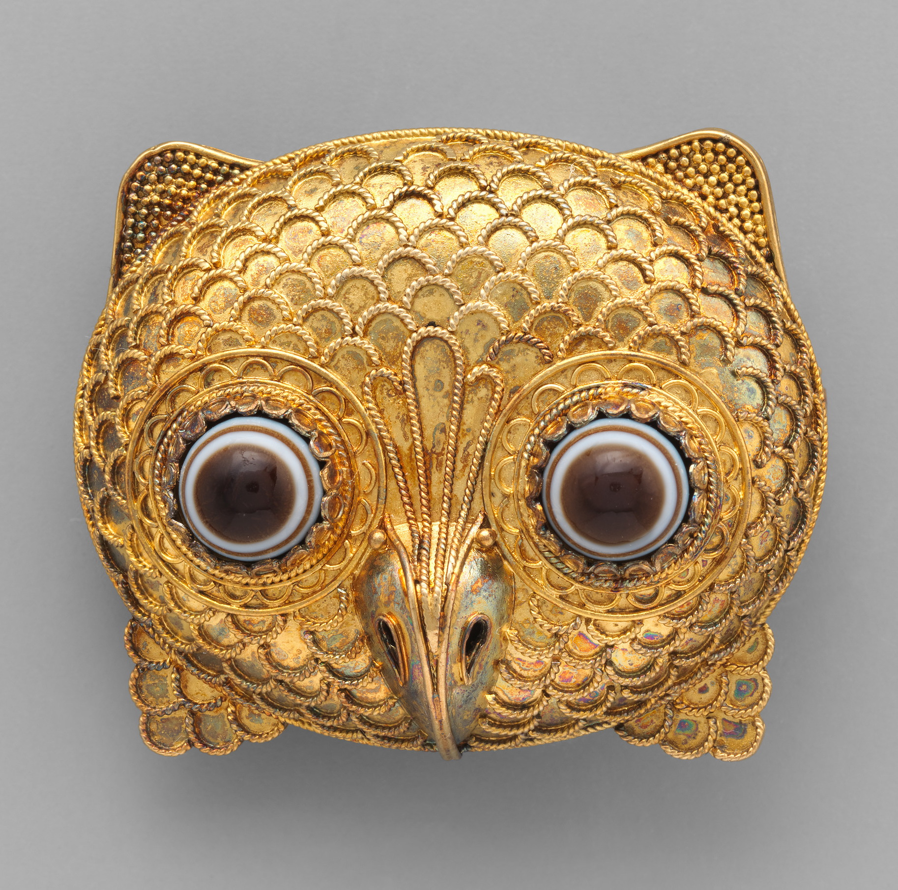 Owl head brooch, made by Castellani, 1860. Metropolitan Museum of Art.