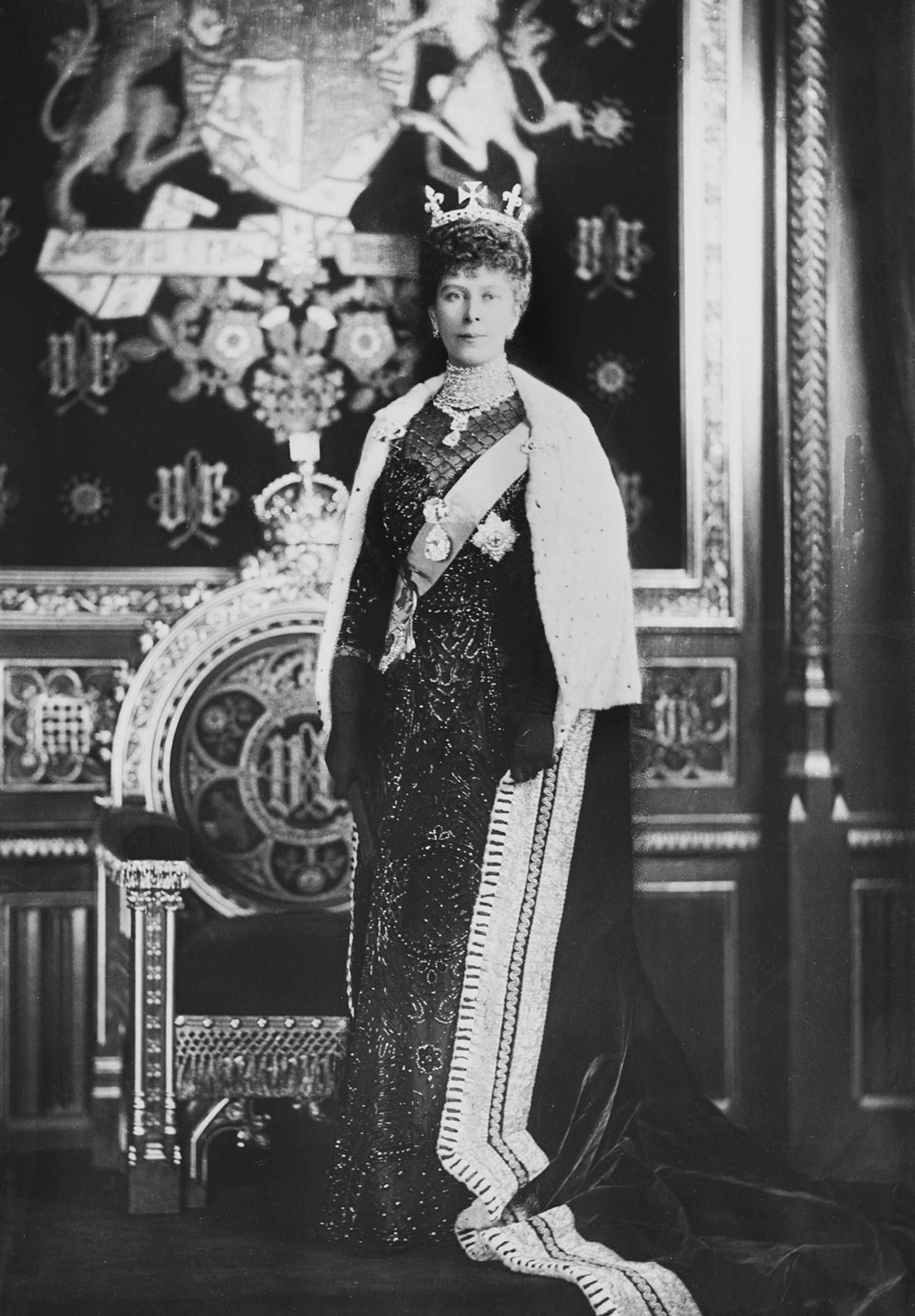 Queen Mary (Elizabeth II's grandmother) wearing the 1,005 carats of Cullinan diamonds. She borrowed Cullinan I and II from the crown jewels as is wearing them as a brooch on her sash. Around her neck is Cullinan III and IV worn together as a pendant, 1911. Royal Collection Trust.