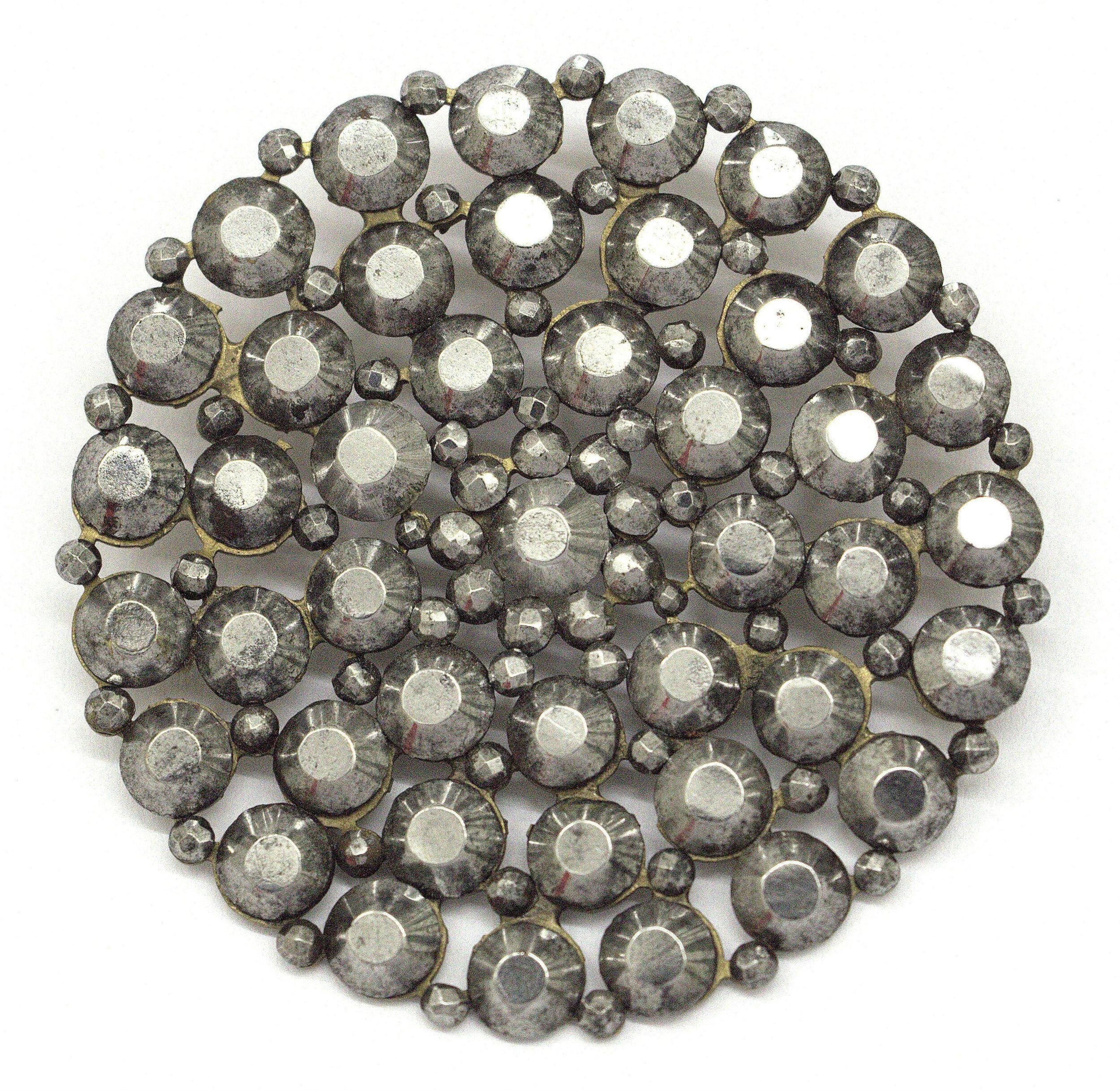 Cut steel button, 1850. Victoria & Albert Museum.