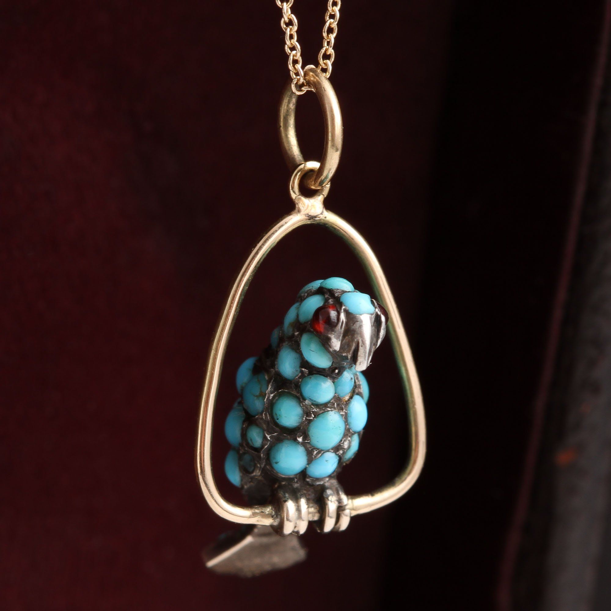 Detail of Victorian Turquoise and Garnet Parrot Charm Necklace
