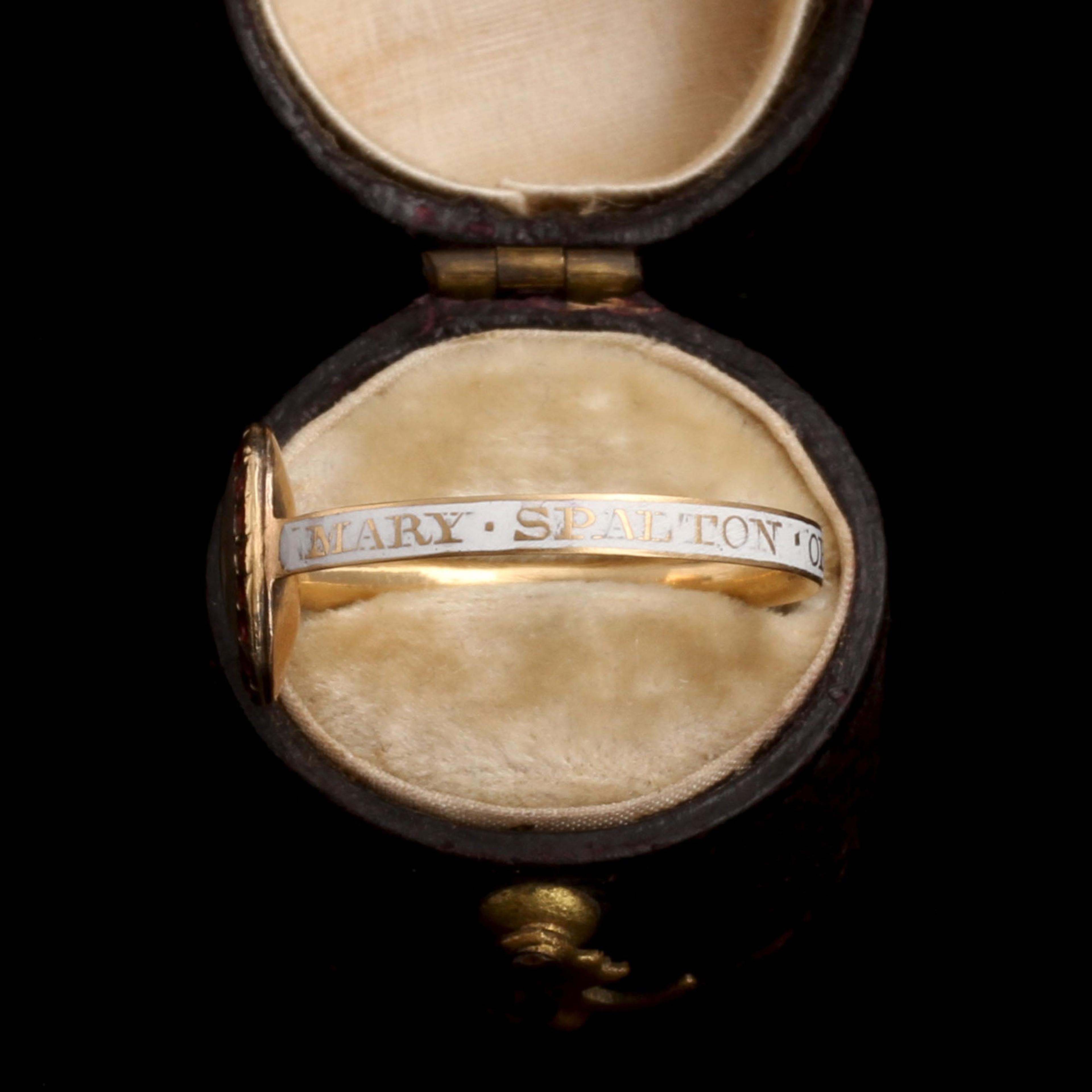 Detail of Georgian White Enamel & Garnet Memorial Ring