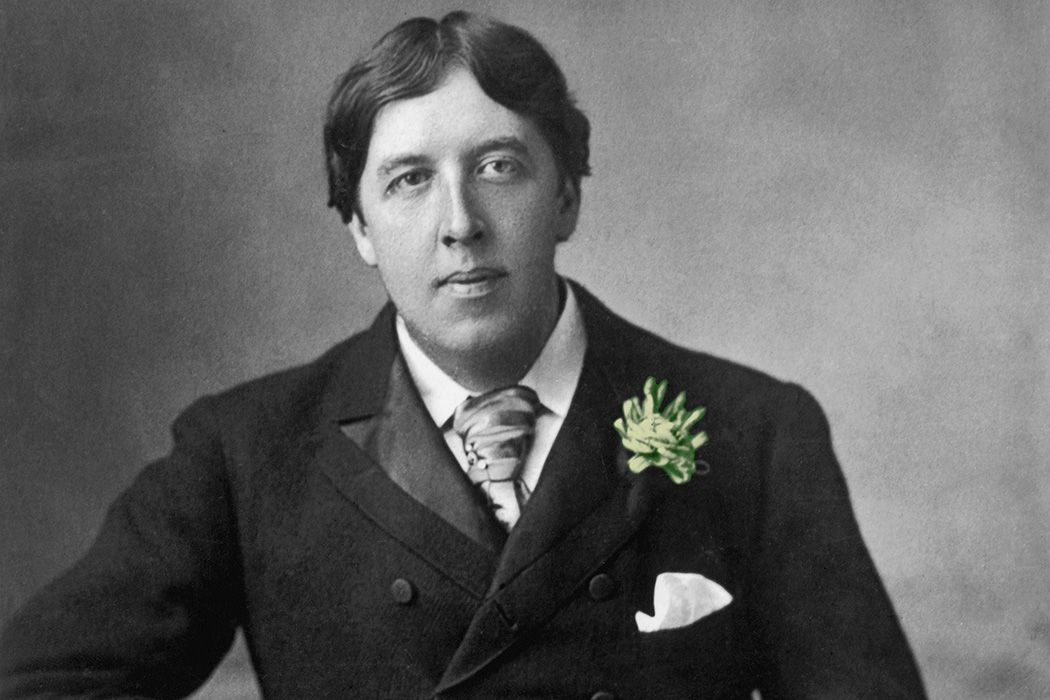 Oscar Wilde wearing a green carnation.