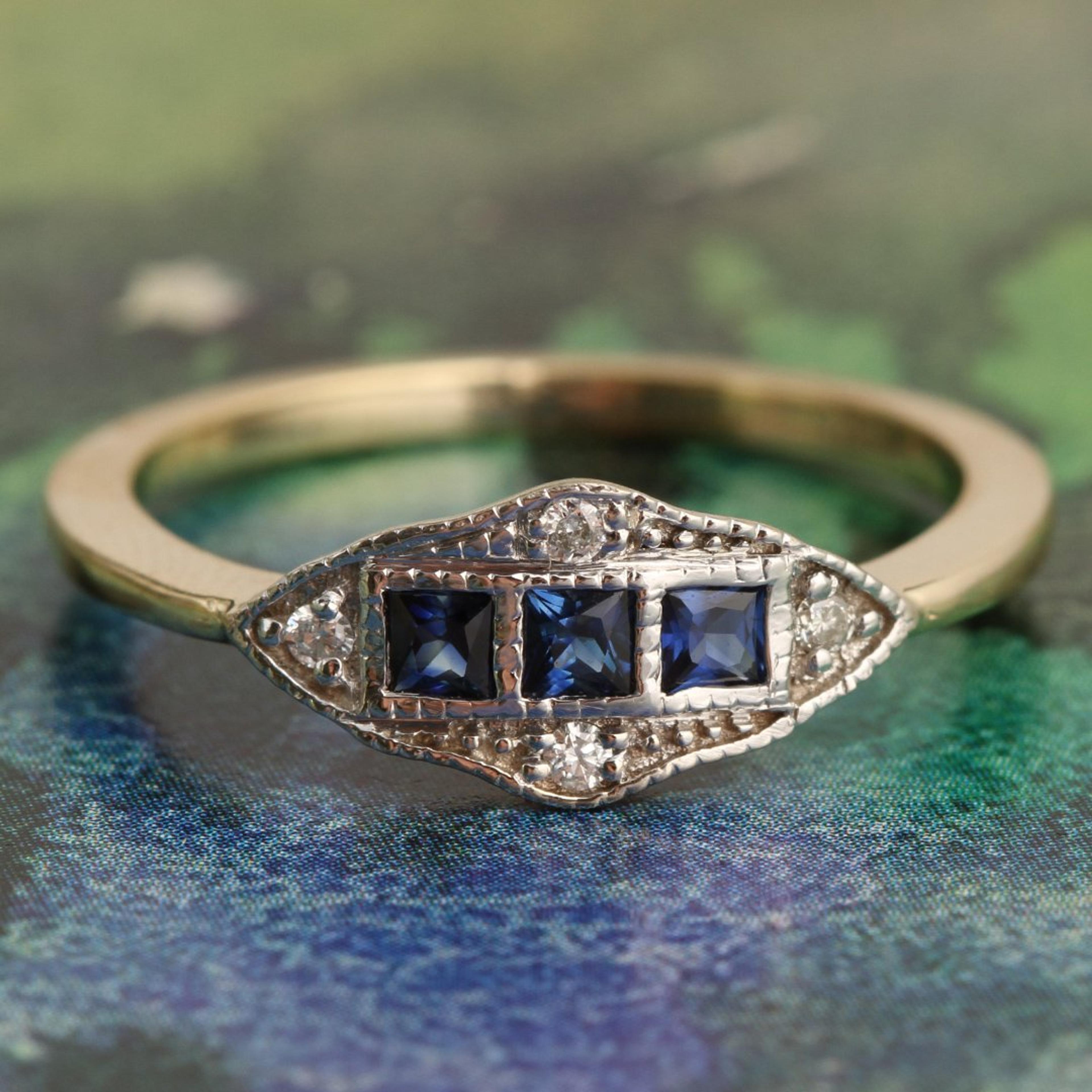 Closeup of Machine Age Ring with three sapphires