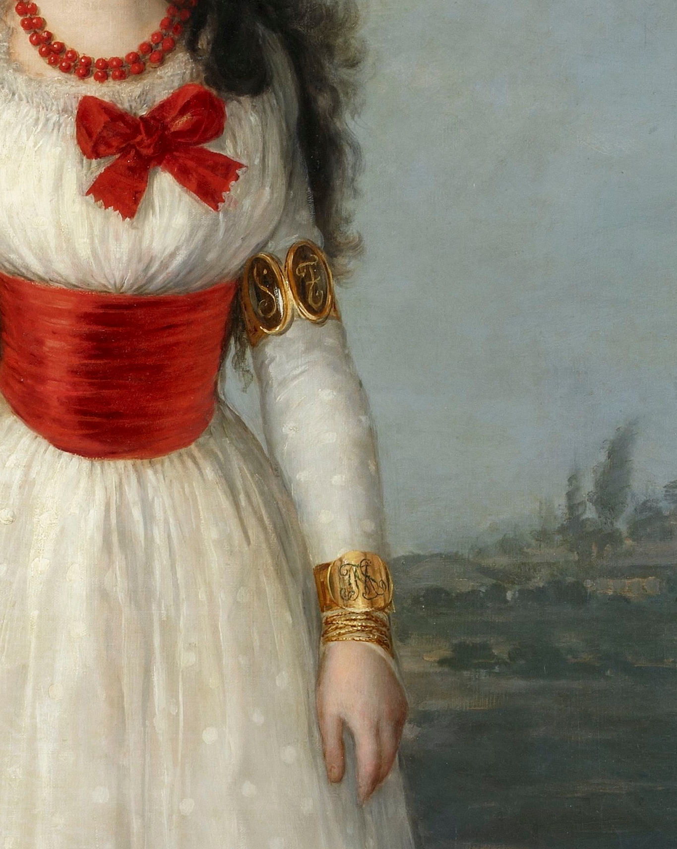 Maria Teresa de Silva wearing a monogram ‘M’ bracelet on her wrist. The White Duchess by Francisco Goya, 1795