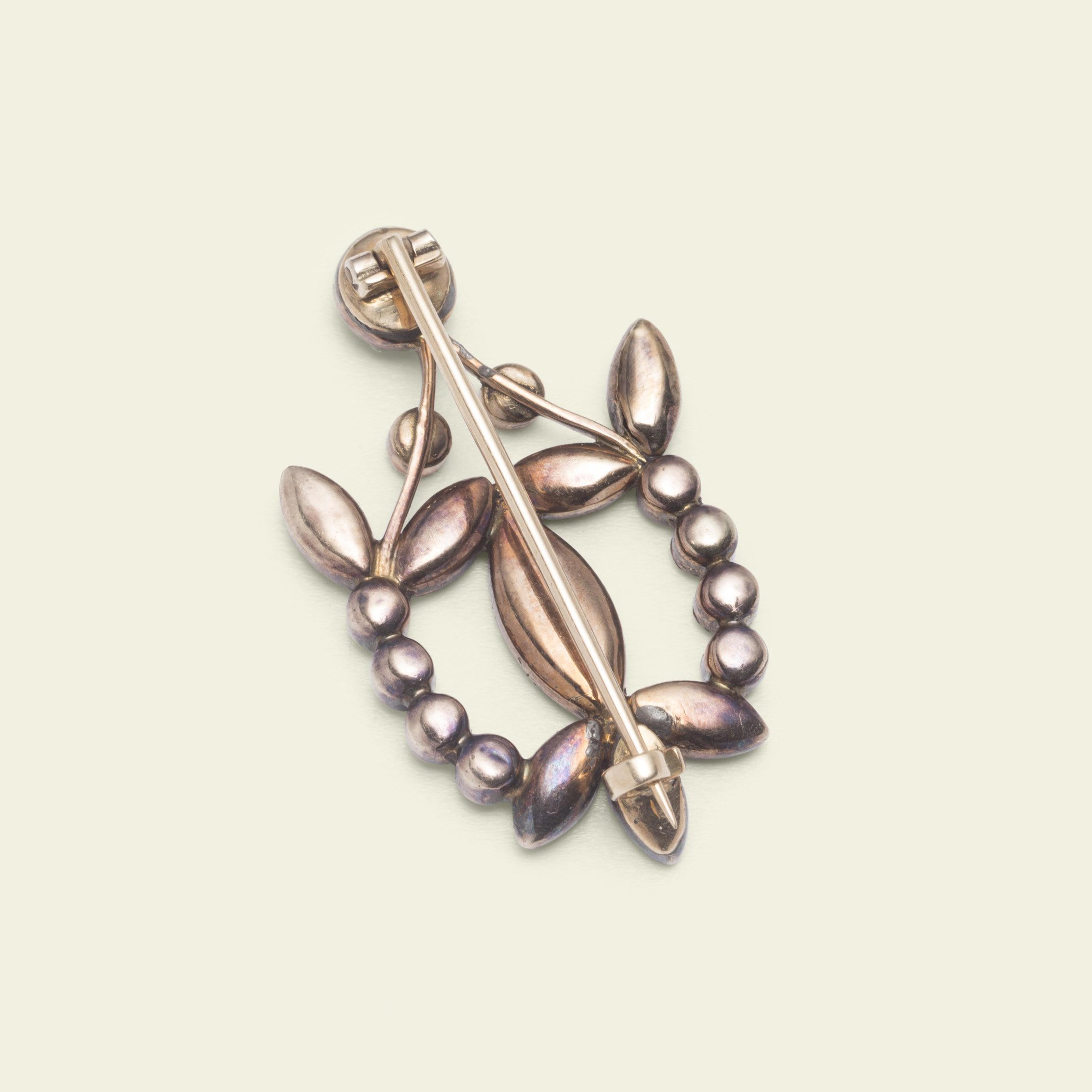 Detail of Floral Garnet Halley's Comet Brooch