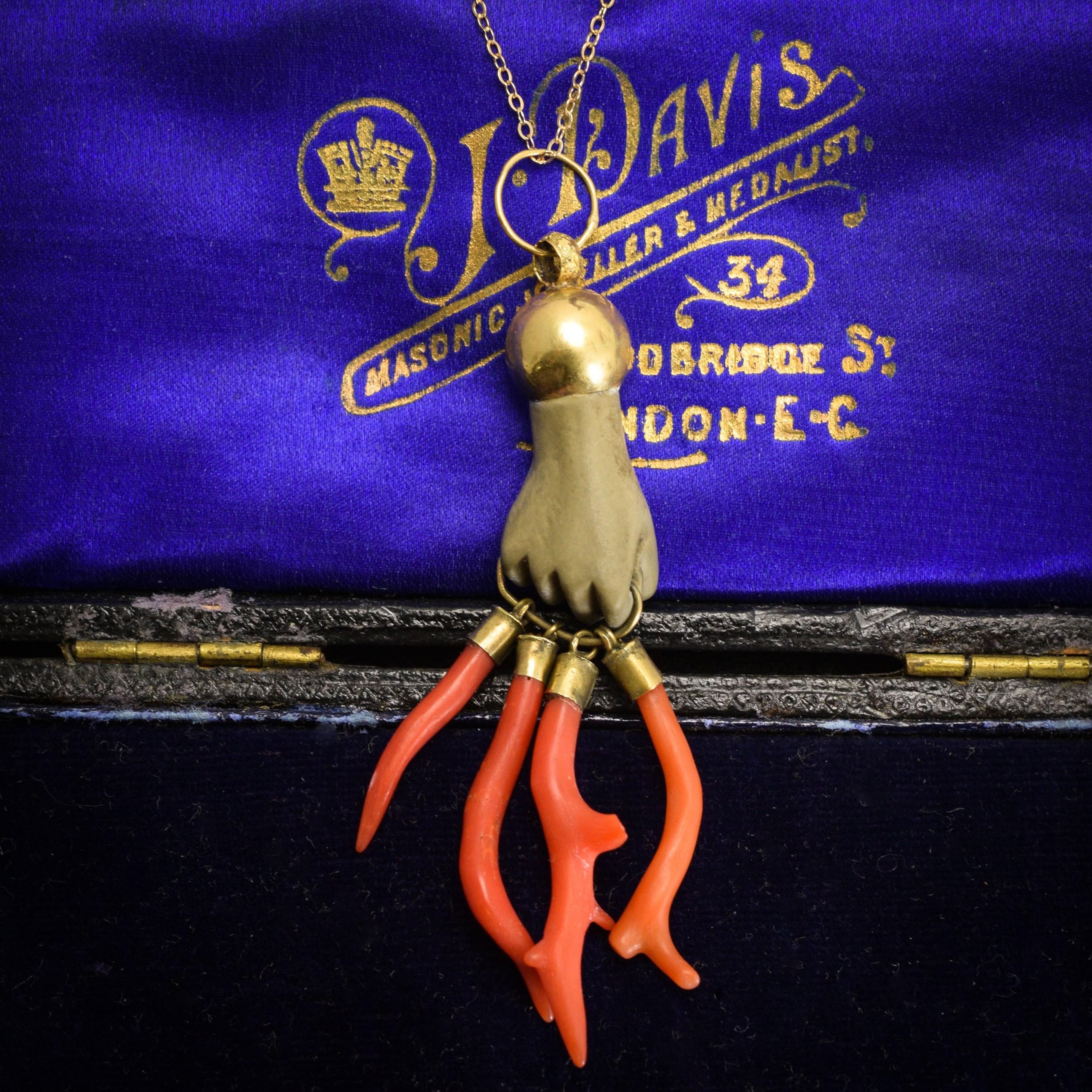 Detail of Grand Tour Lava Hand with Branches of Coral Necklace