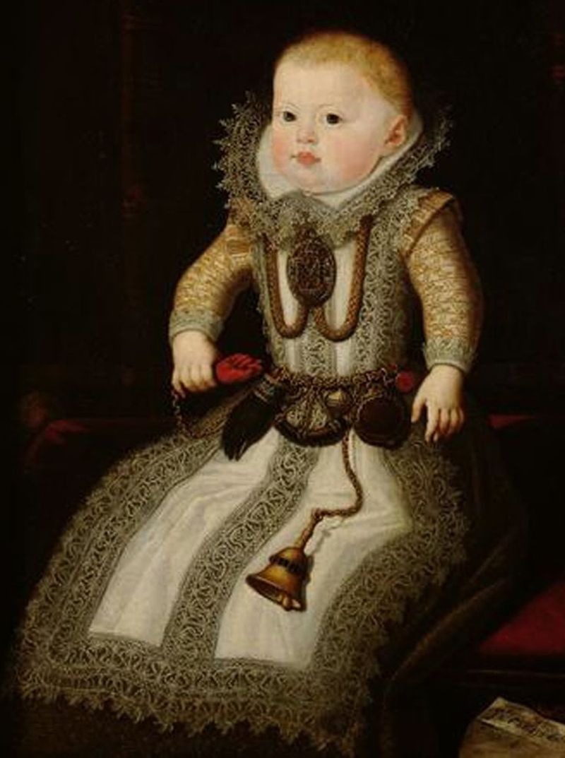 Portrait of the Infant Maria Anna, c. 1607, Juan Pantoja de la Cruz. She wears nine protective ornaments including a fica, badger's paw, bird's claw, apotropaic bell and pomander.