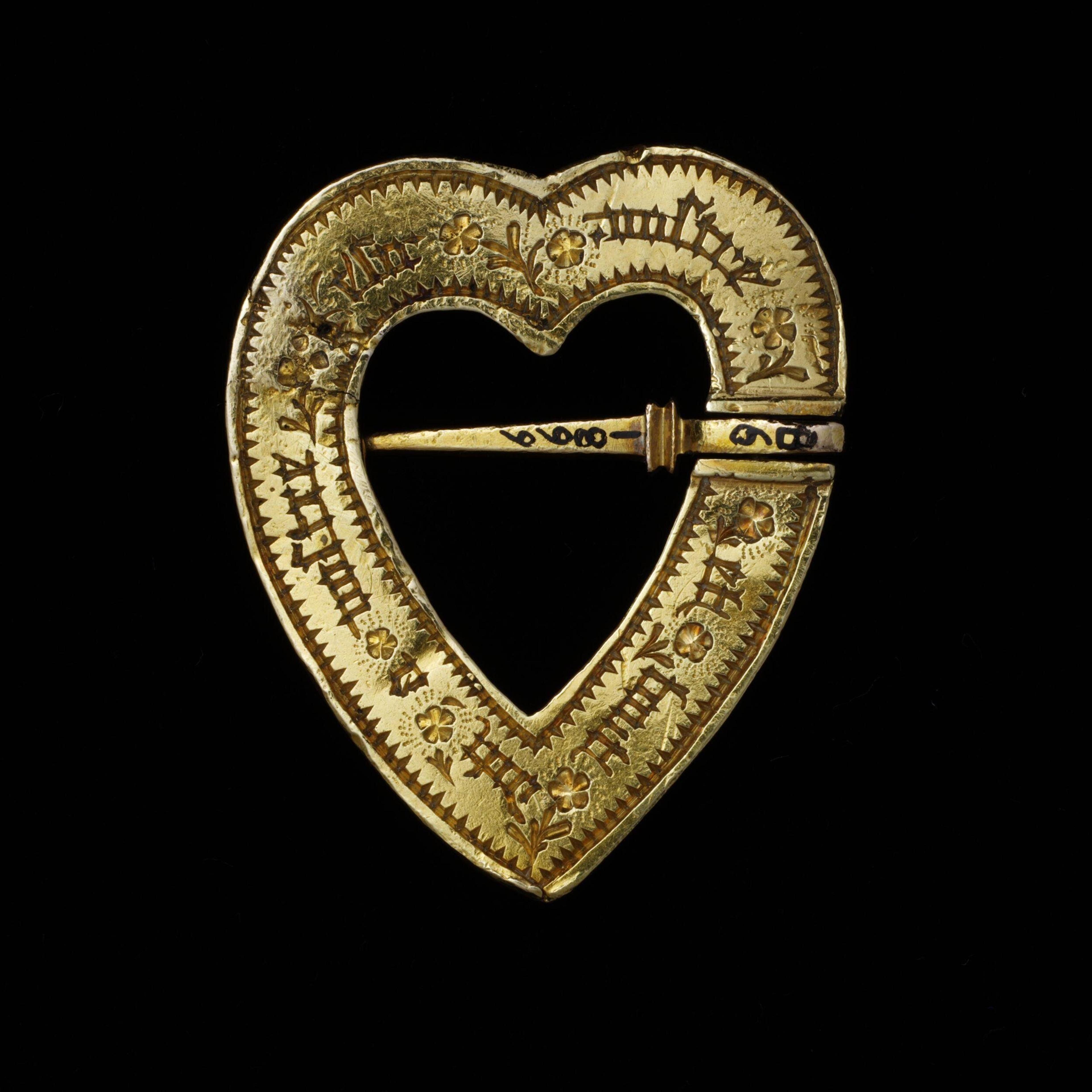 Reverse of a gold brooch, inscribed in Medieval French "Ours and always at your desire", 1400. The Victoria & Albert Museum.