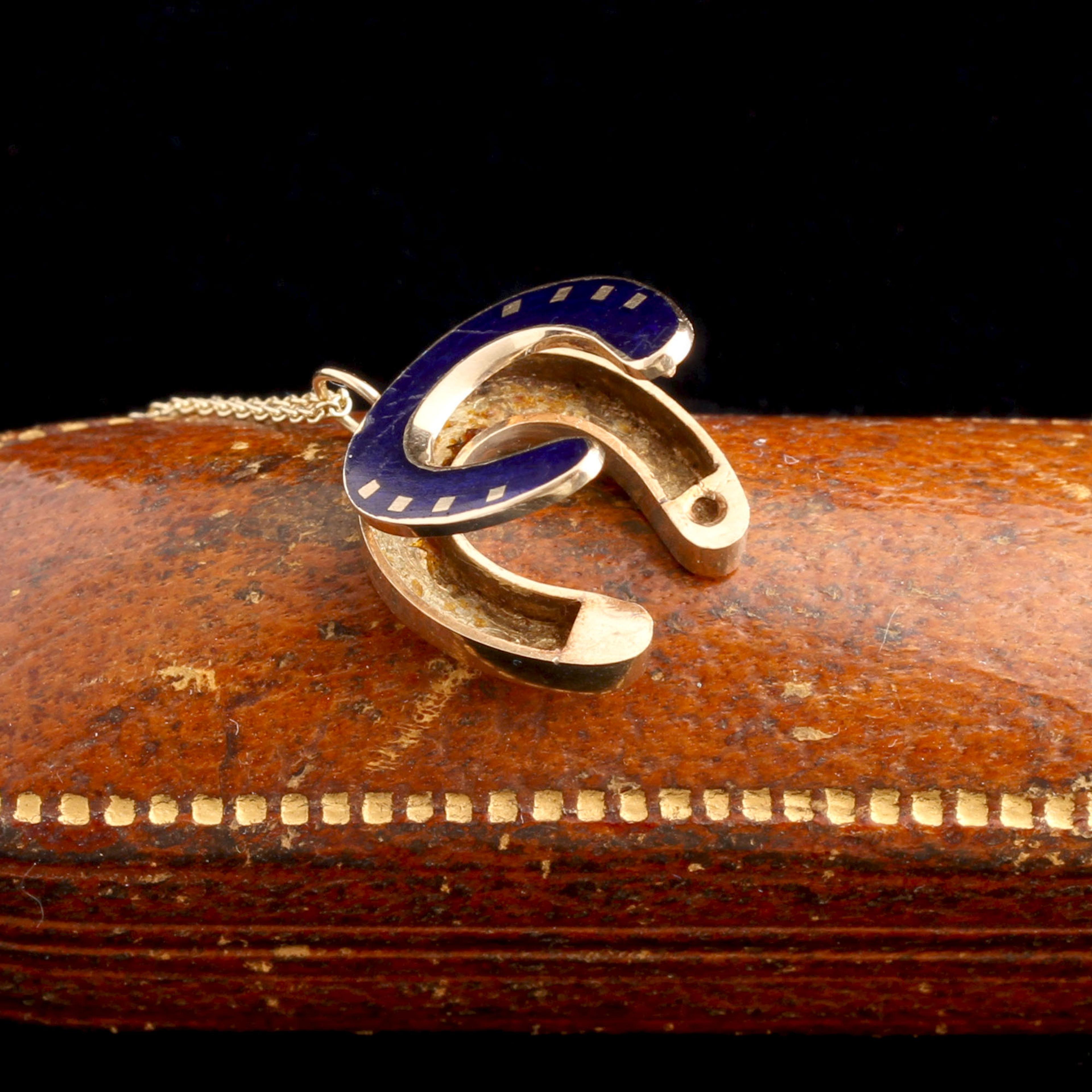 Detail of Edwardian Enamel Horseshoe Locket Necklace shown open