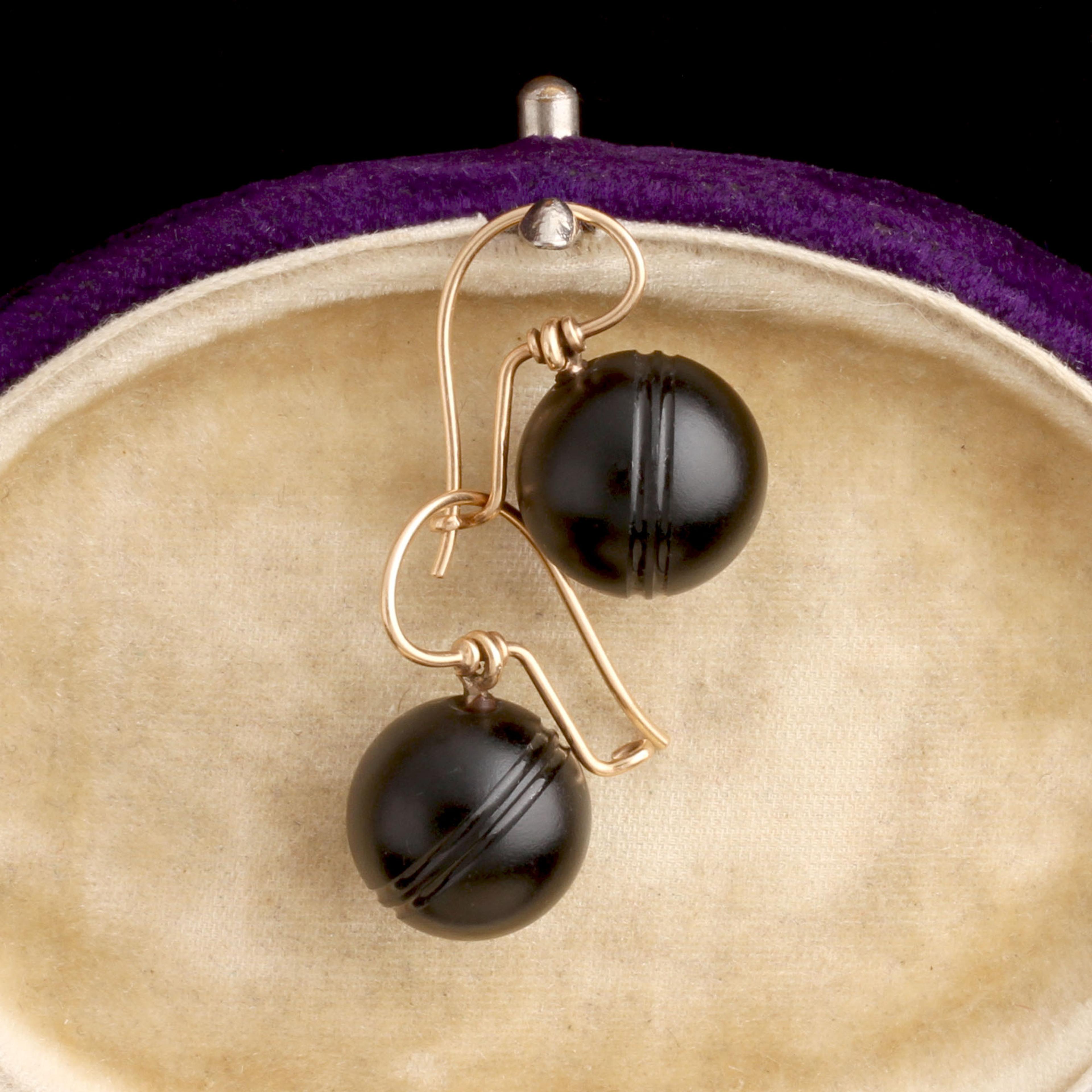 Detail of Victorian Carved Onyx Sphere Earrings