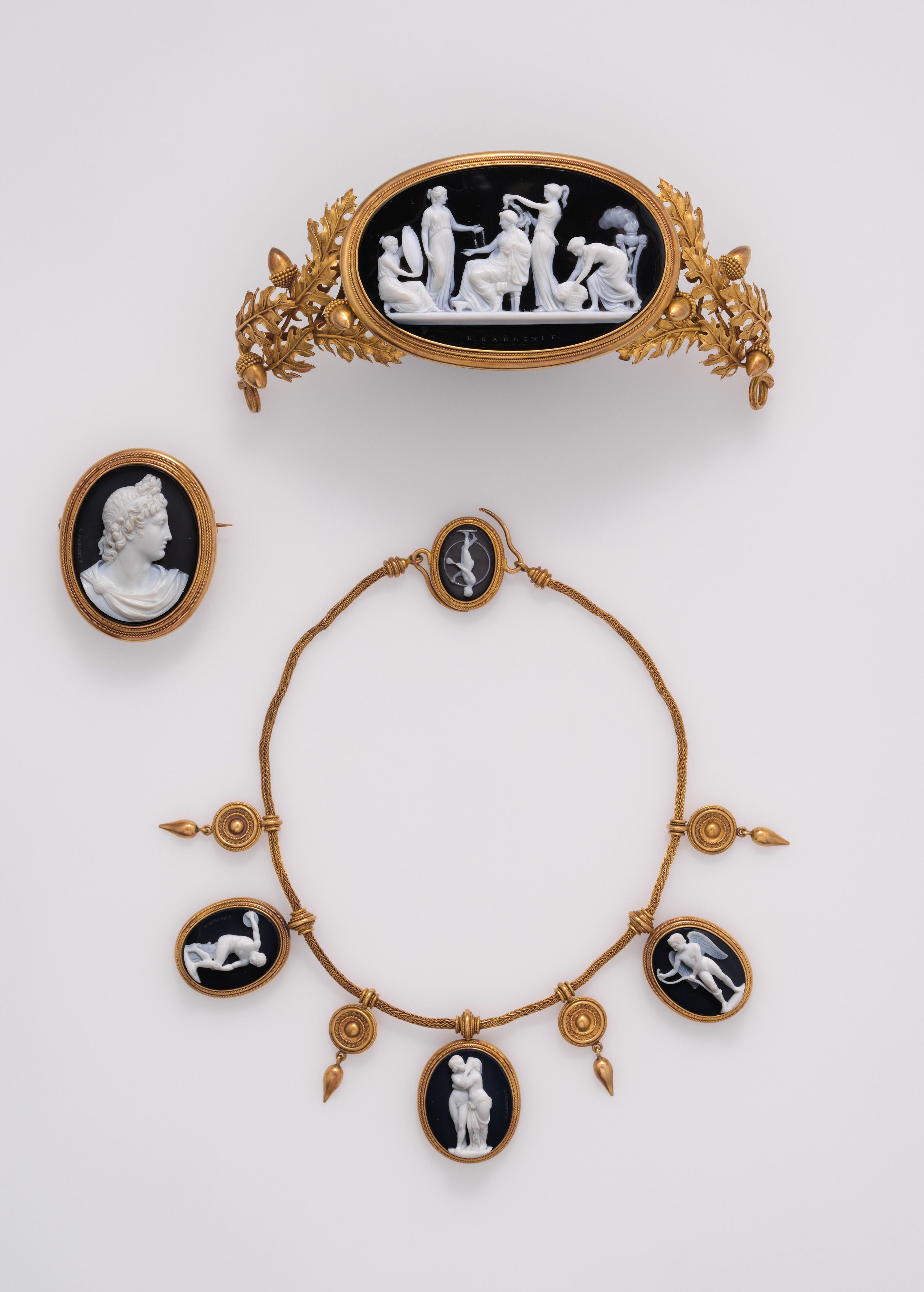 Cameo parure: tiara, necklace and brooch. Carved by Luigi Saulini. In the collection of the Metropolitan Museum of Art.