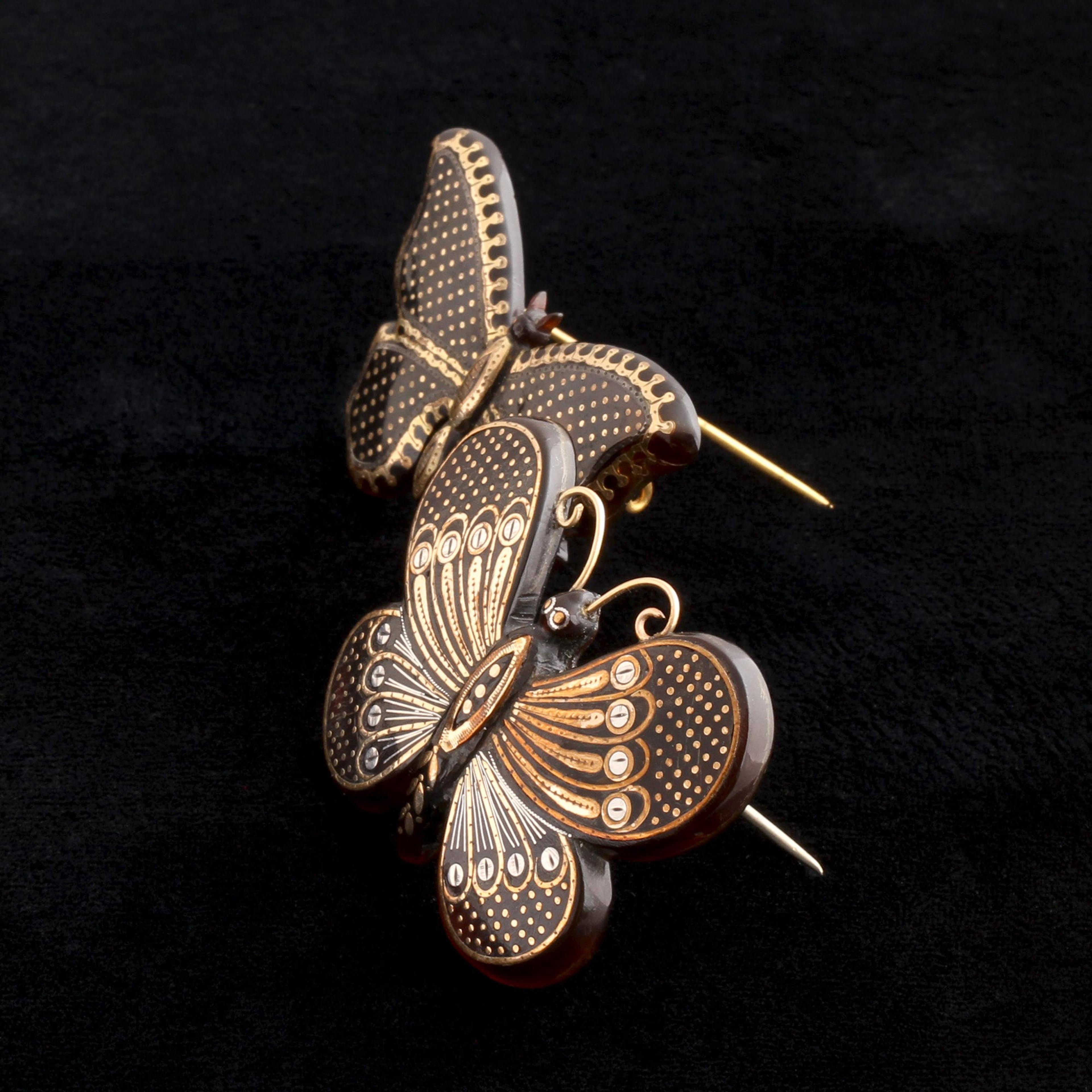 Detail of Victorian Pique Butterfly Brooches