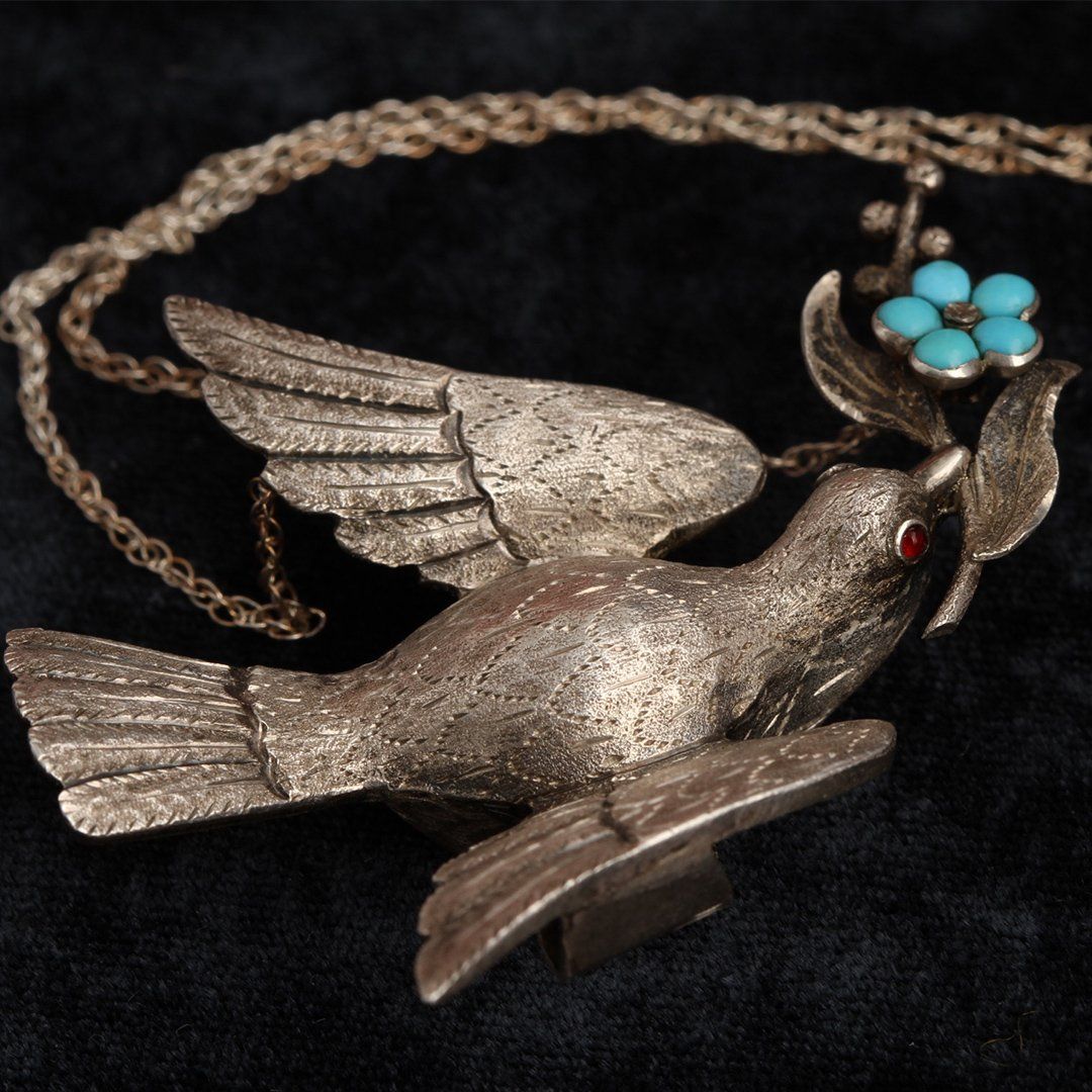 Detail of Mid Victorian Silver Dove Necklace with Garnet Eyes and Turquoise Forget Me Not