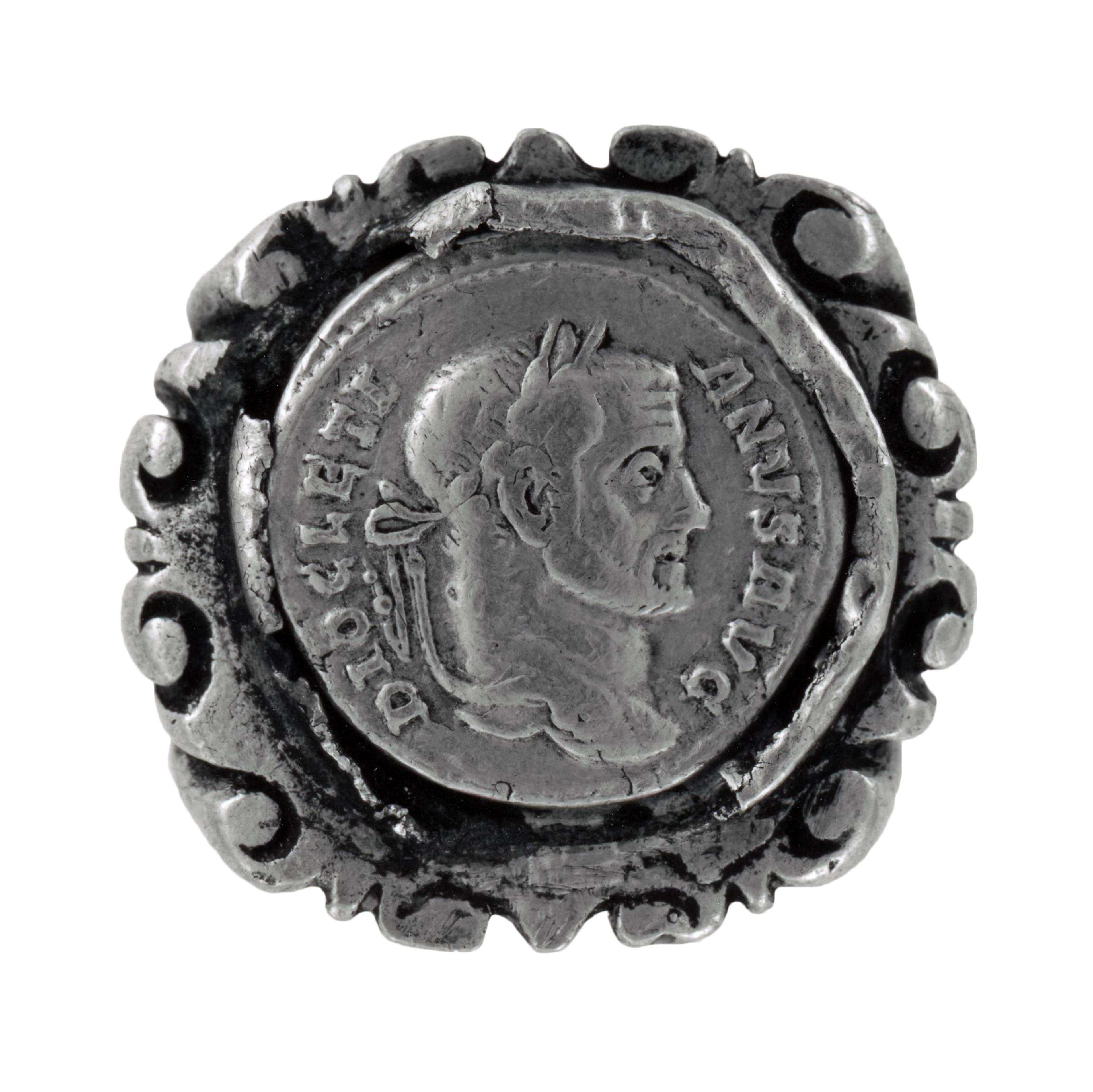 Ring with the image of Emperor Diocletian (r. 284-305). The reverse shows four soldiers sacrificing in front of a camp. Thought to have been worn by a soldier to show allegiance to the emperor.British Museum.