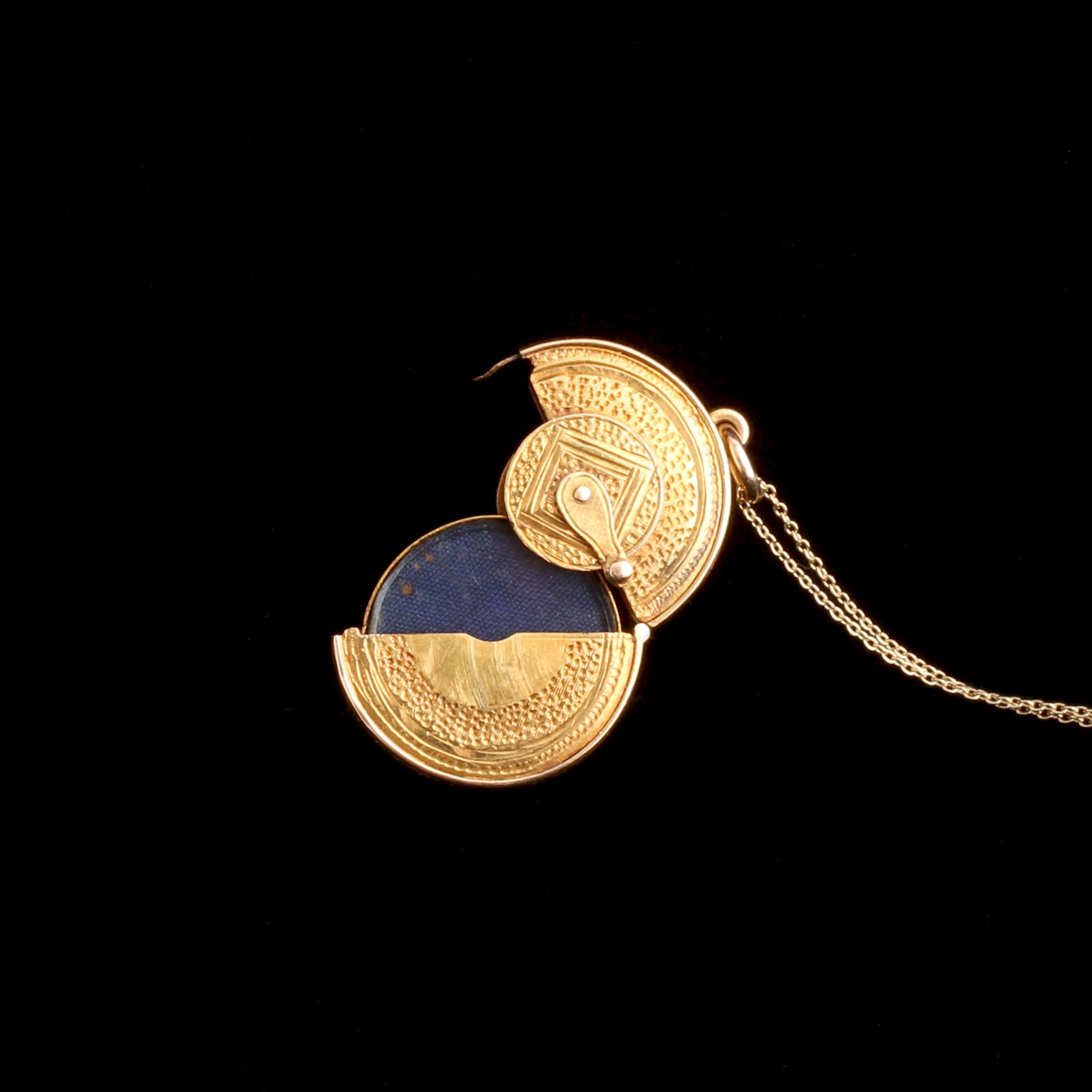 Detail of Victorian Measuring Tape Sliding Locket