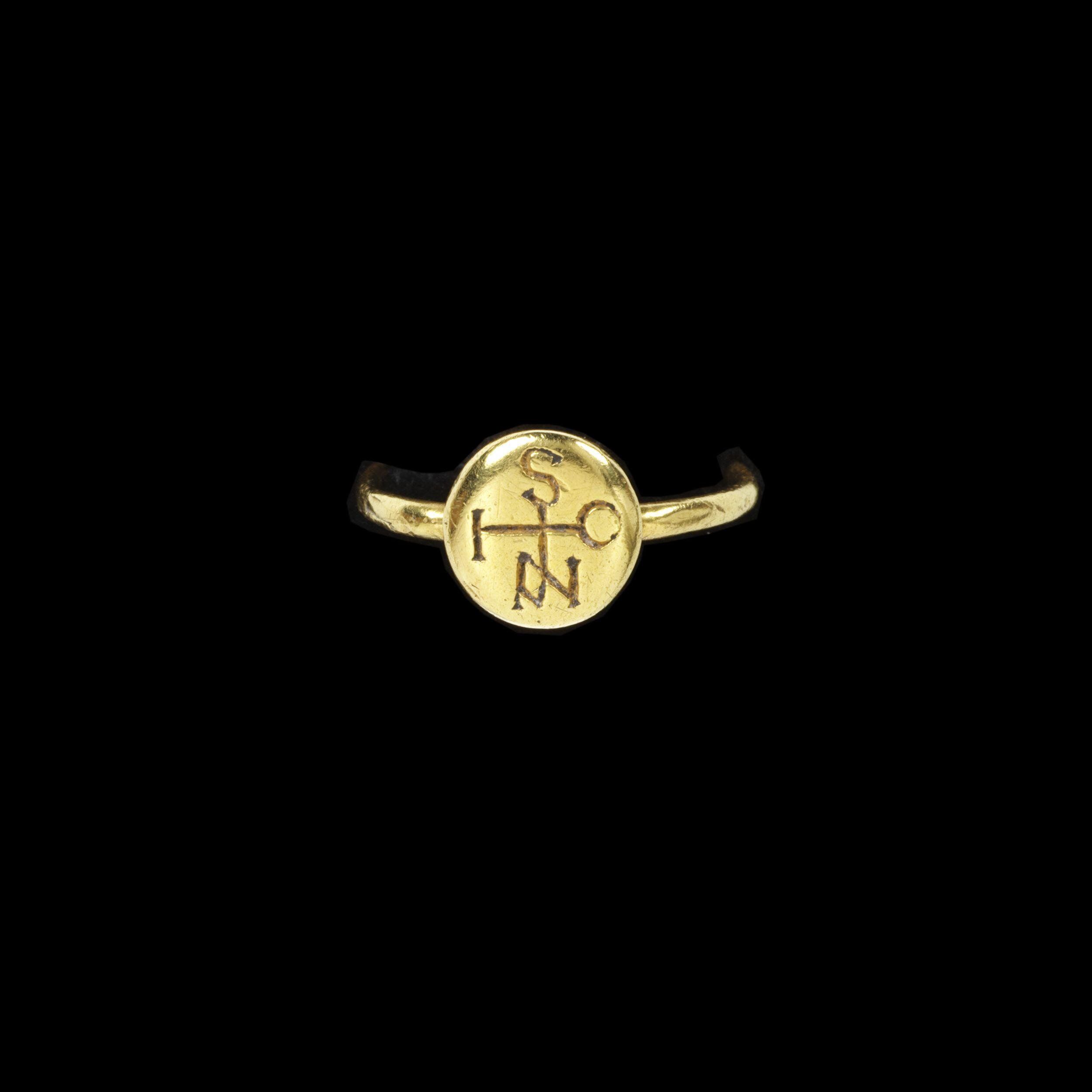 Cross monogram ring spelling "IOANIS" or John, made in the 6th-7th century. The Victoria & Albert Museum.