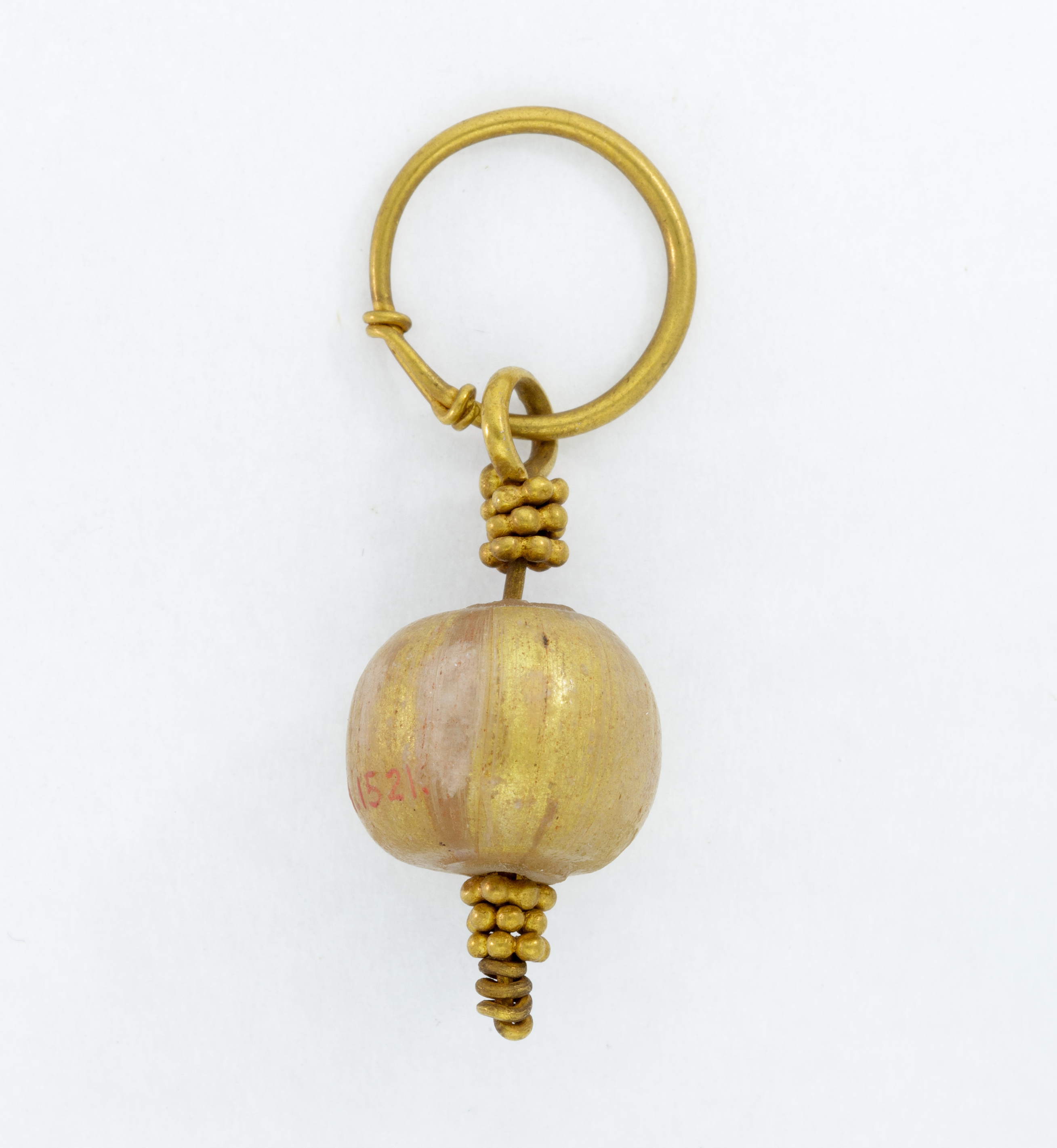 Gilded or silvered glass was popular from mid-first century B.C. to the mid-first century A.D., which is when this gilded bead earring was produced. The Metropolitan Museum of Art.