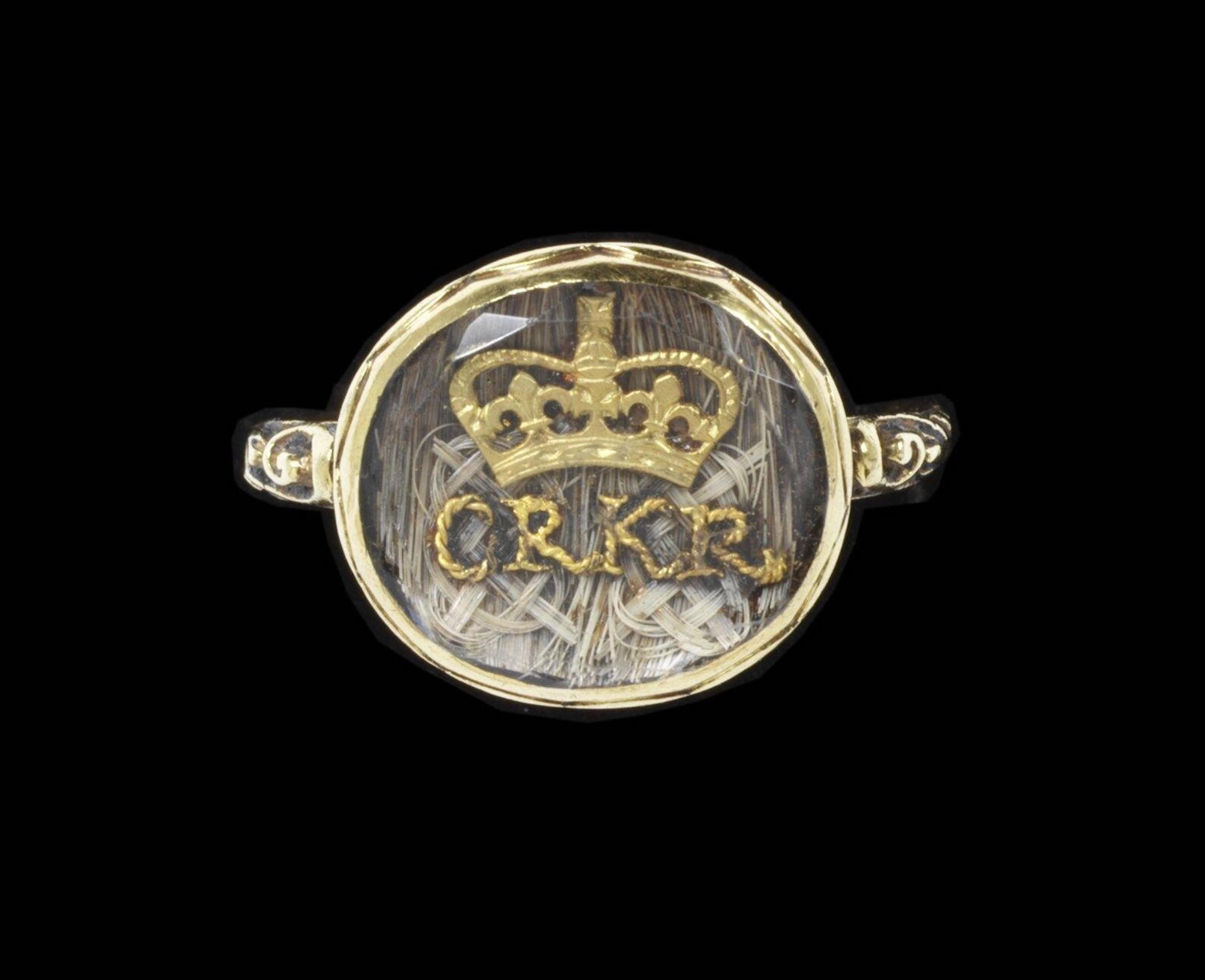 Ring, 1685-1705, in the collection of the V&A Museum. “CR” stands for “Charles Rex.” Rex=King.