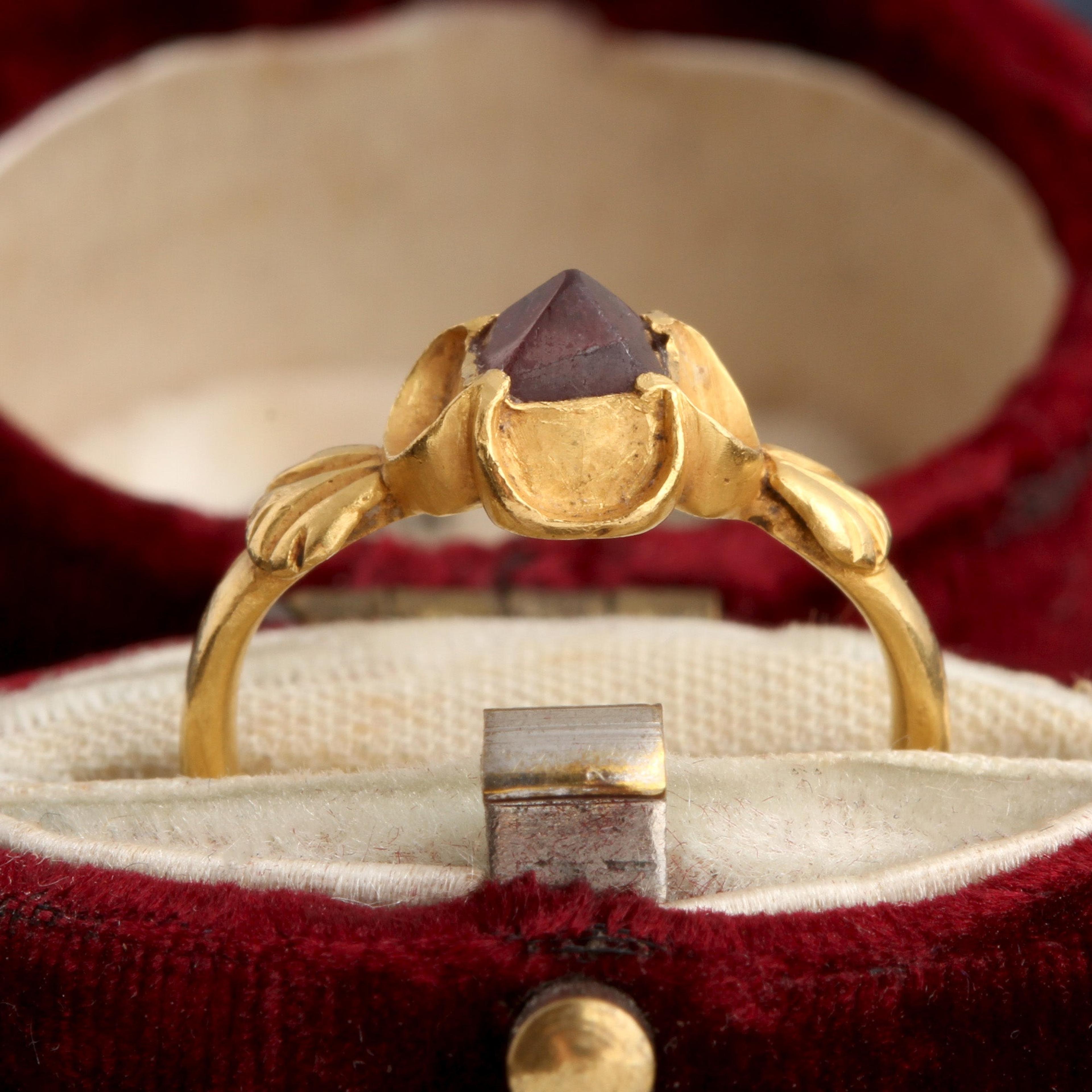 Detail of Post Medieval Point Cut Garnet Quatrefoil Ring