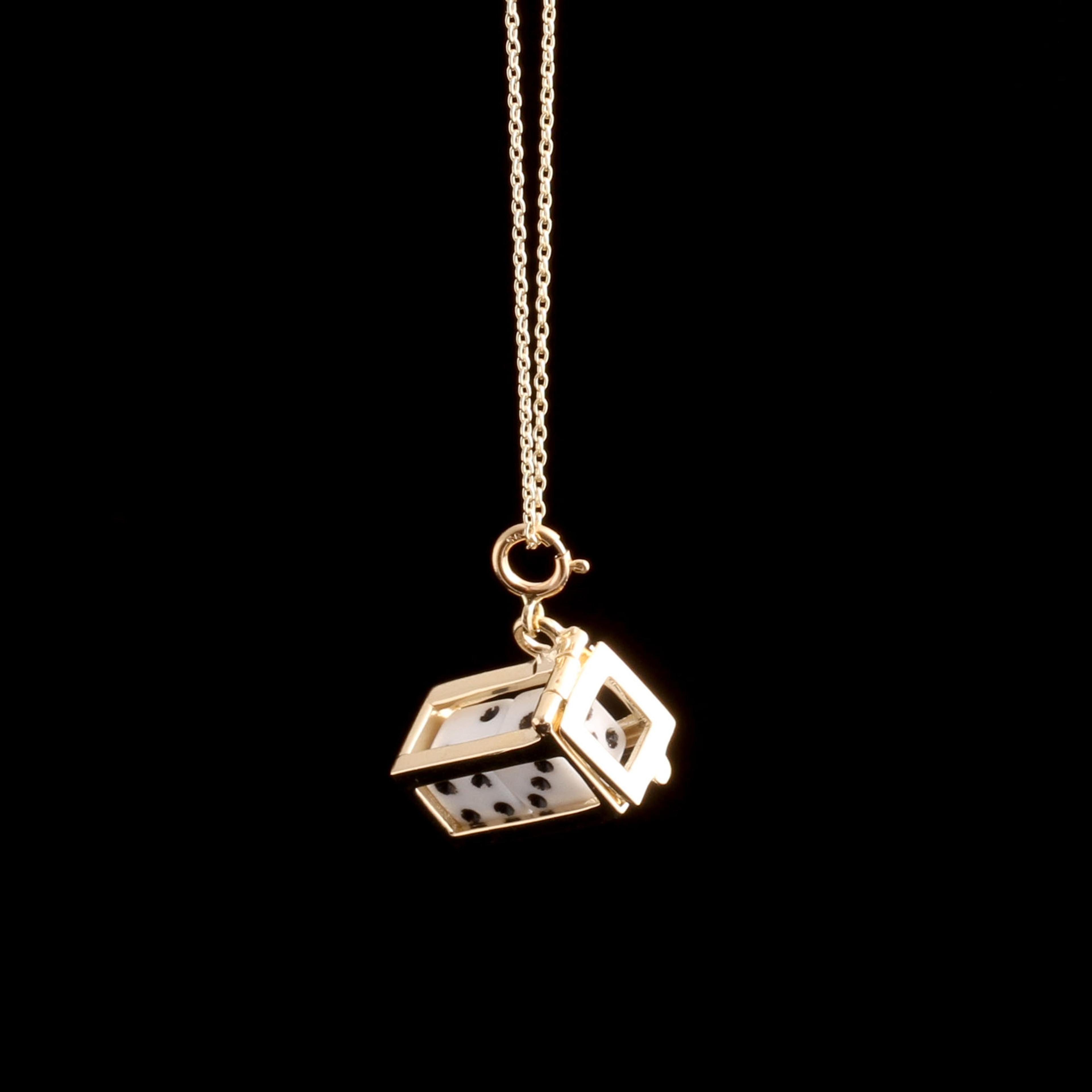Detail photo of the dice/fortune amulet