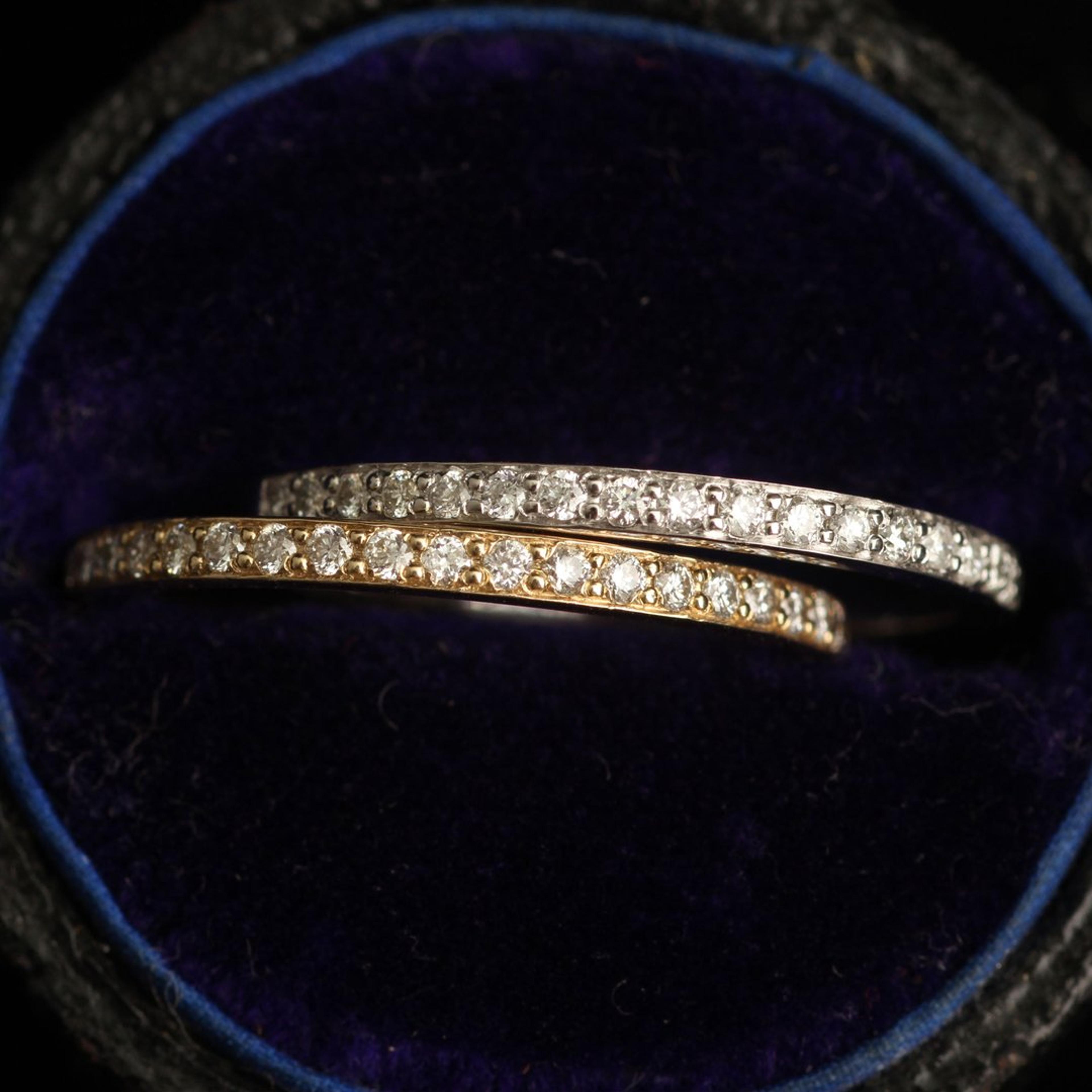 Detail of one Diamond Half Eternity Band (White Gold) and one Diamond Half Eternity Band (Yellow Gold)