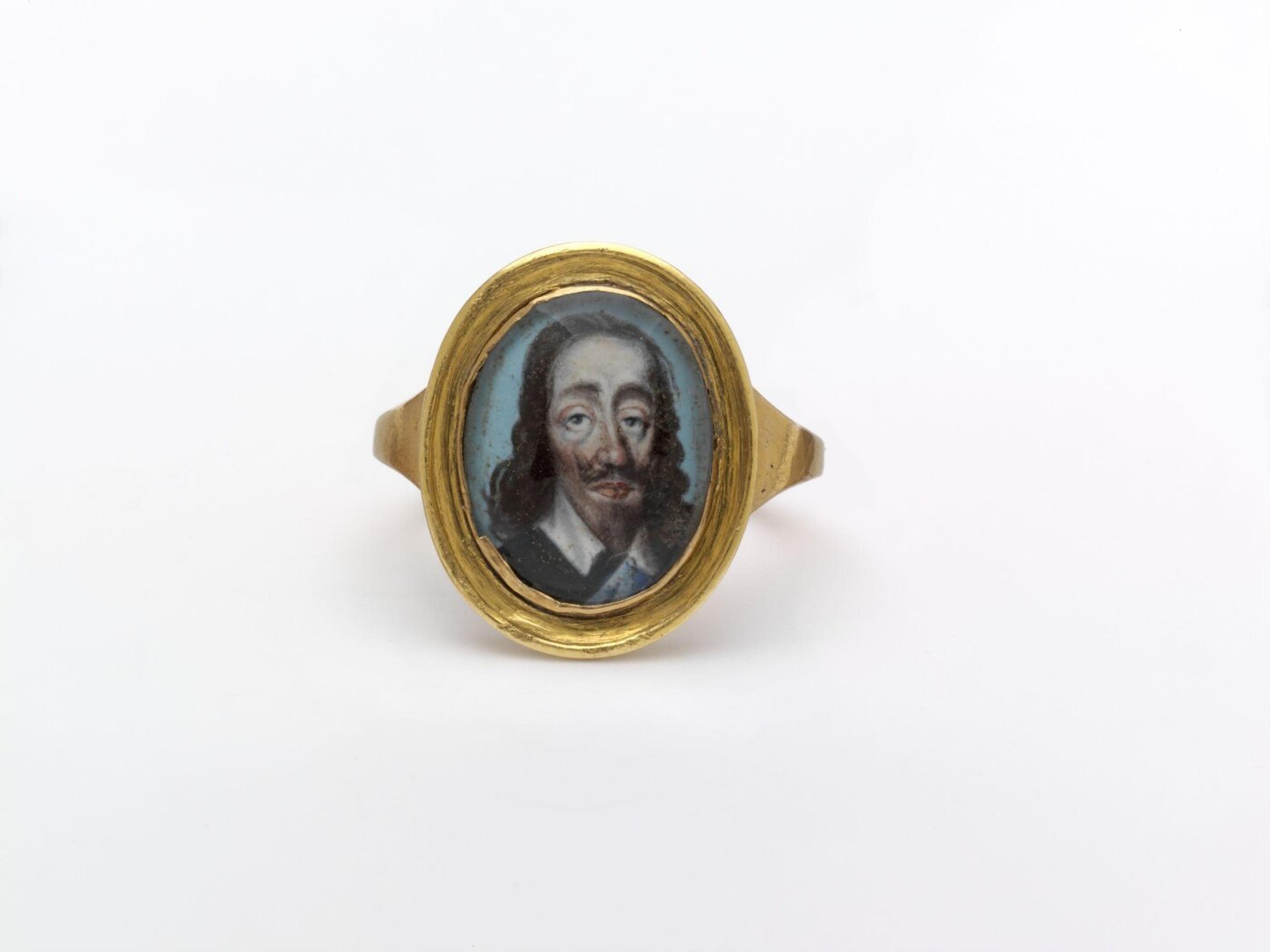 Ring with face of Charles I, 17th c. painting, 18th c. setting. In the collection of the V&A Museum.