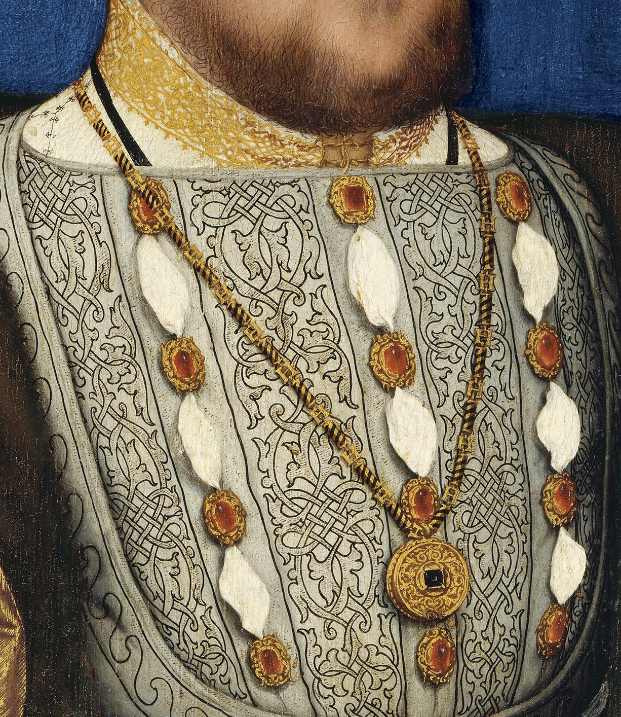 Note the ‘H’ detail on the chain. Detail from Henry VIII by Hans Holbein the Younger, c.1530, Museo Thyssen.