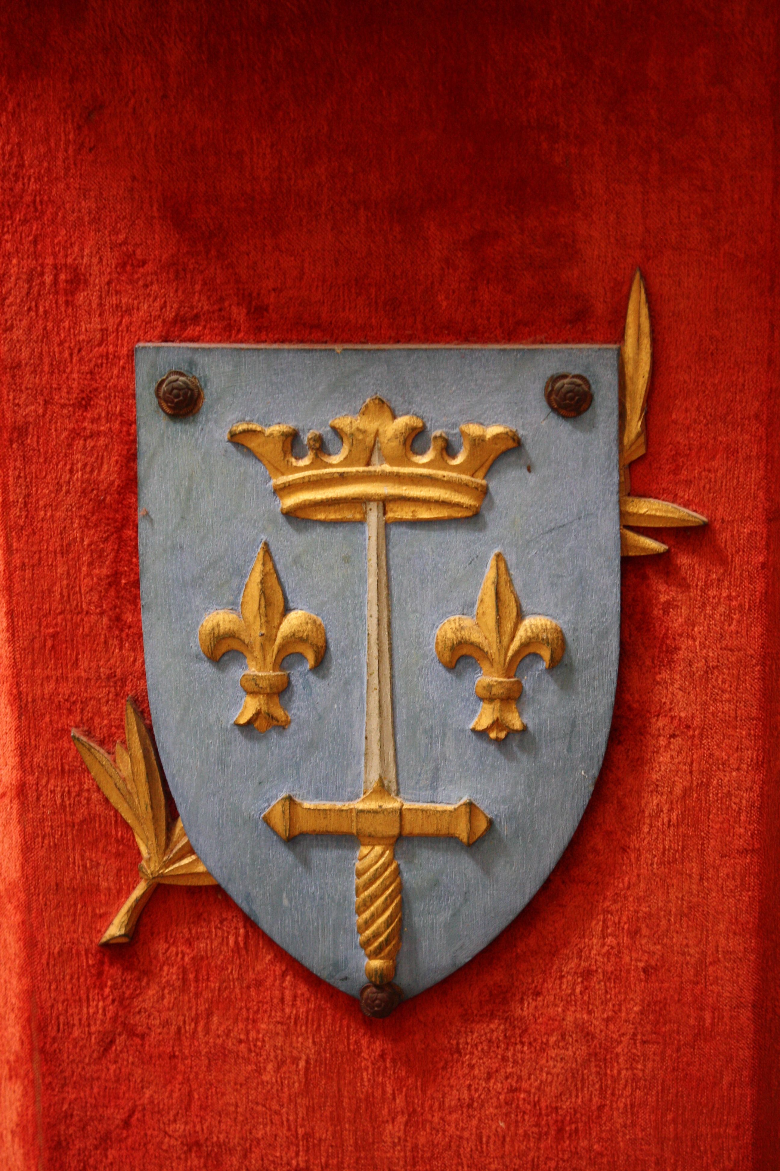 The coat of arms of Joan of Arc (c. 1412 - 1431 CE). Eglise de la Trinite, Vendome, France.