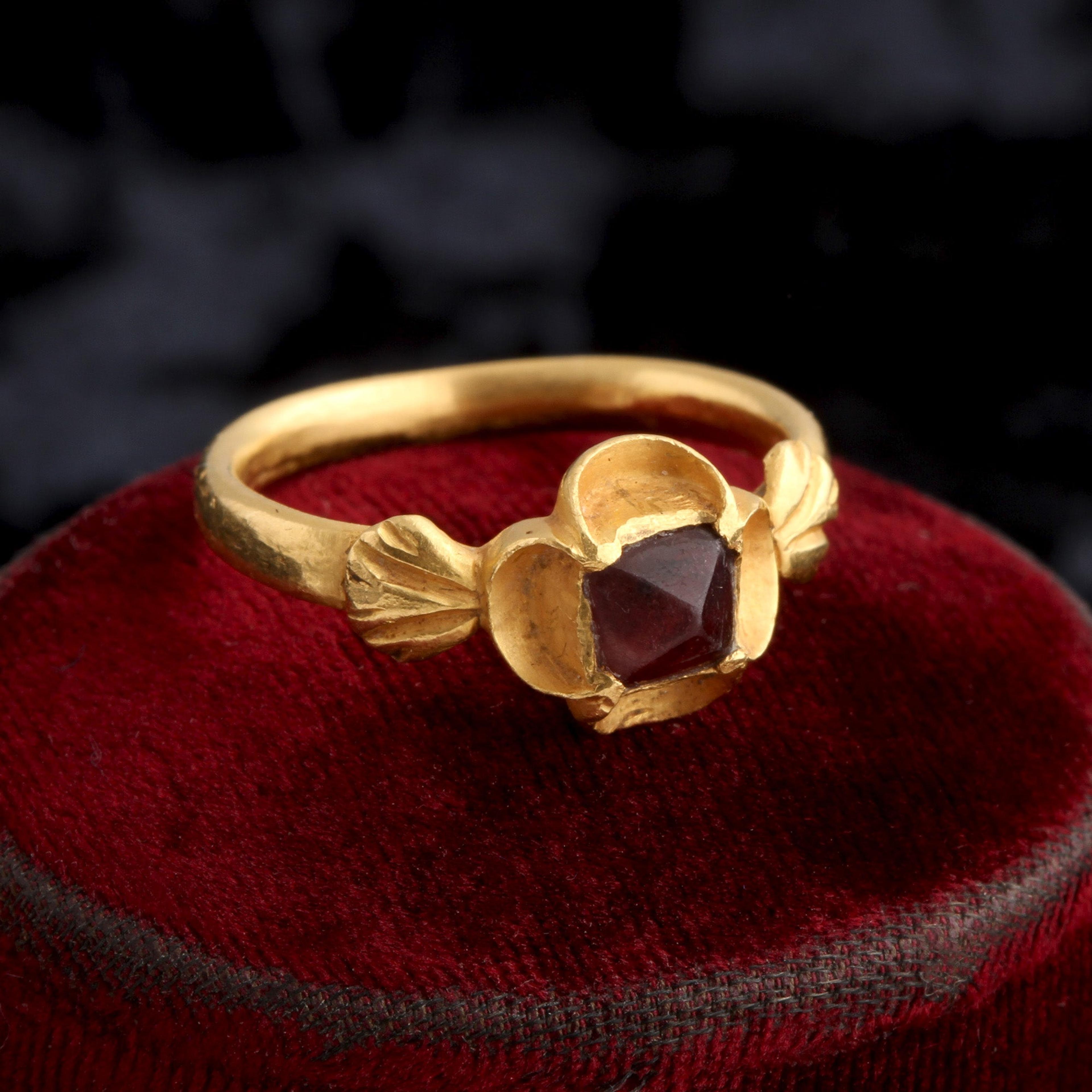 Detail of Post Medieval Point Cut Garnet Quatrefoil Ring