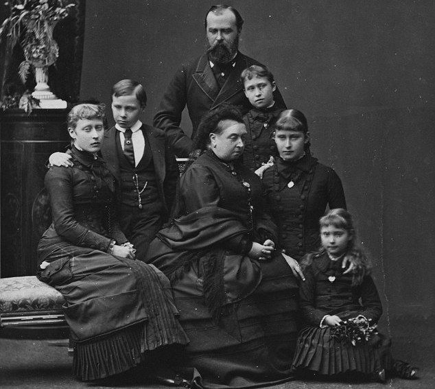 Queen V and her family in mourning in 1879, two months after Alice's death. 