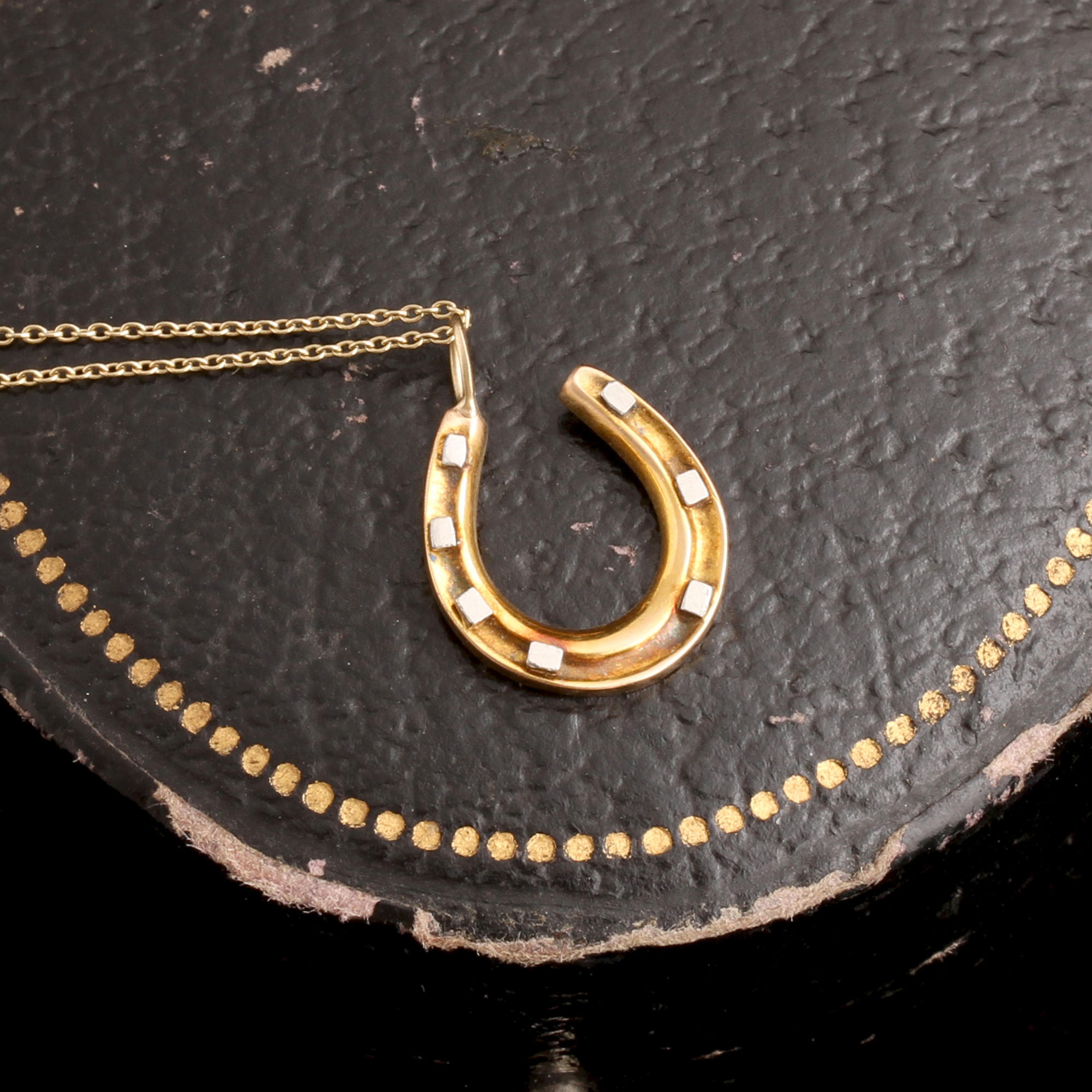Edwardian Platinum Riveted Gold Horseshoe Necklace